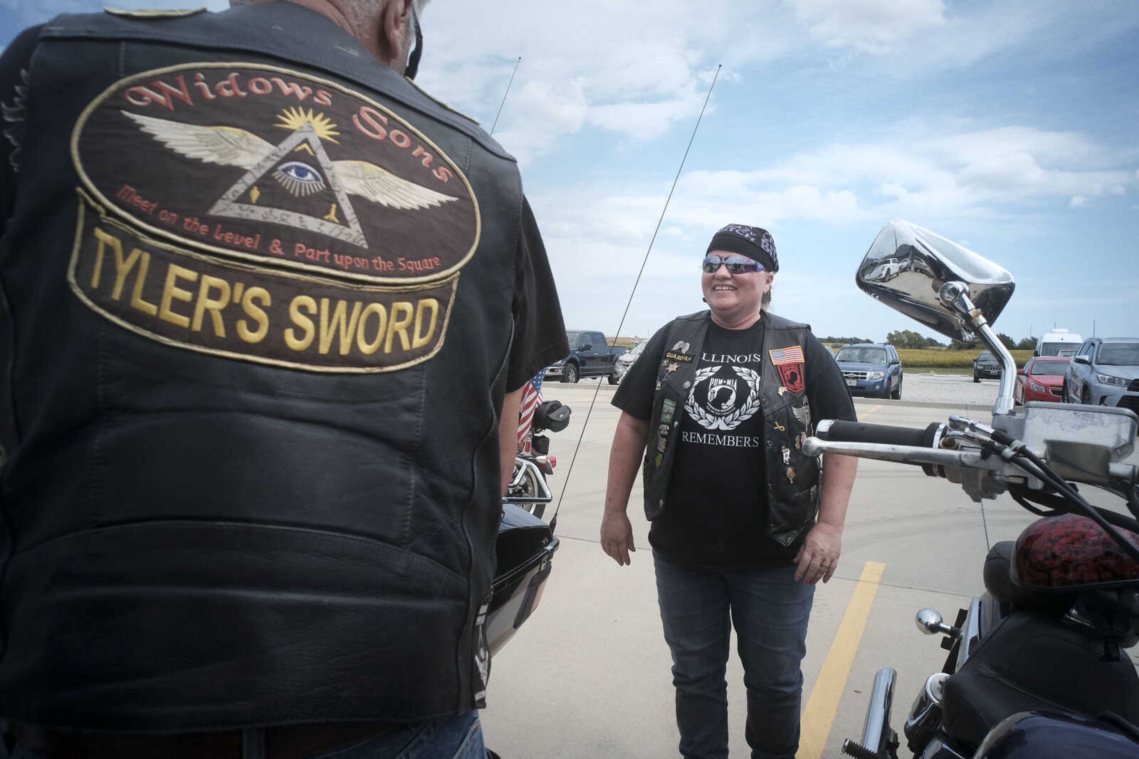 Rhonda LaGois, right, socializes during the first-ever Missouri Vietnam Wall Run  Saturday, Sept. 21, 2019, at the Missouri's National Veterans Memorial in Perryville.