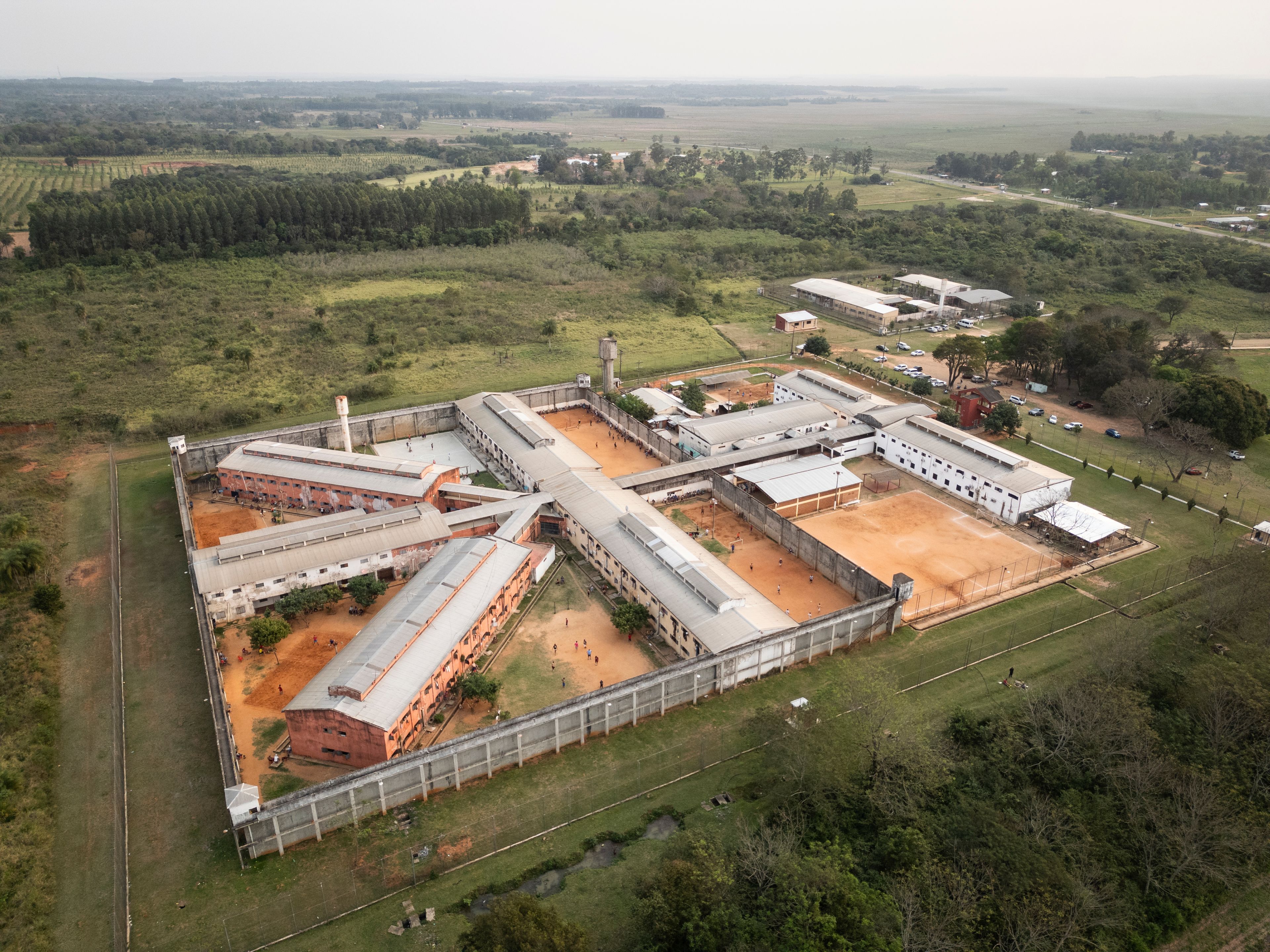 The Regional Penitentiary is surrounded by fields in Coronel Oviedo, Paraguay, Friday, Aug. 30, 2024. (AP Photo/Rodrigo Abd)