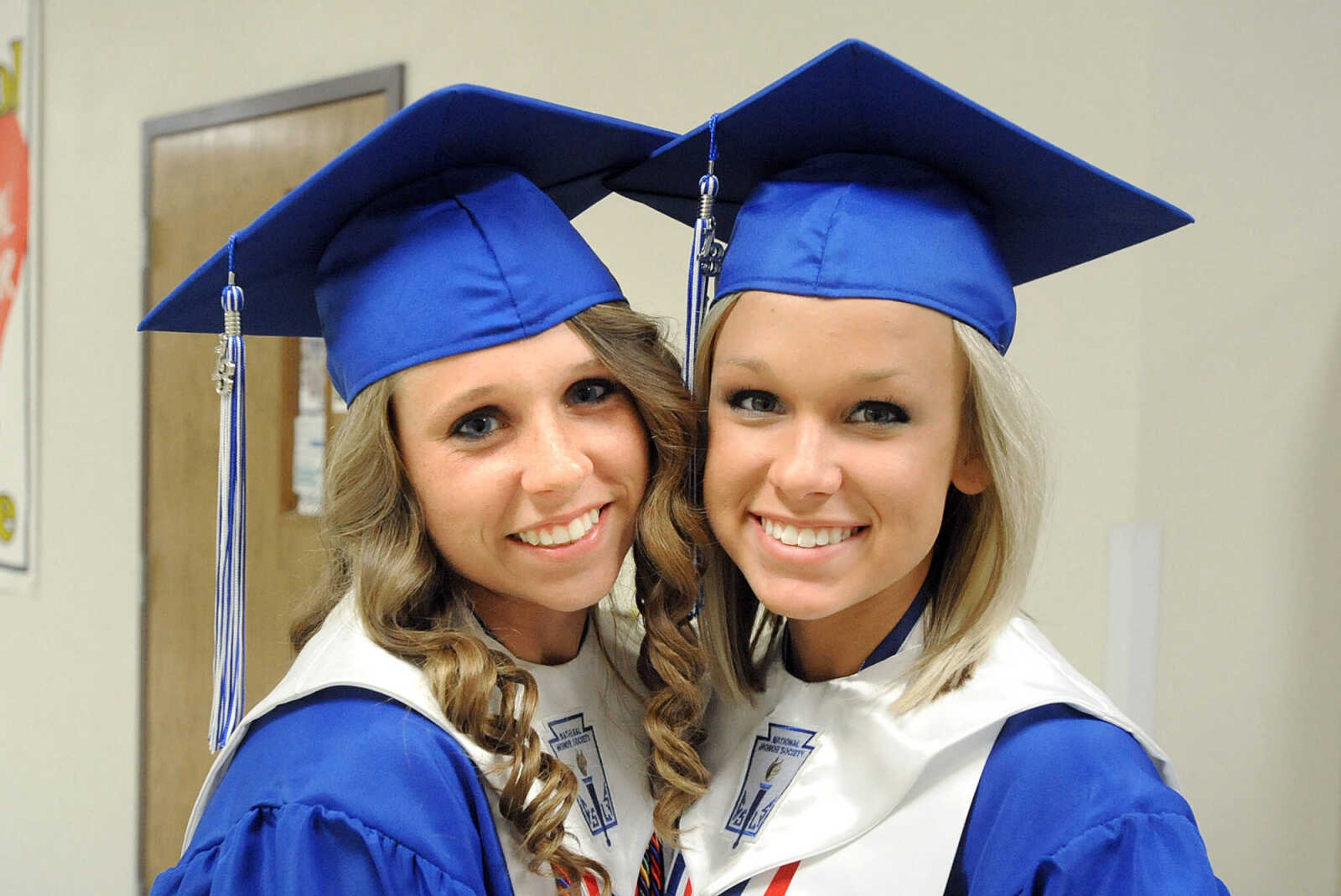 LAURA SIMON ~ lsimon@semissourian.com

Notre Dame Regional High School graduates Olivia Renner, left, and Morgan Conrad pose for a photo, Sunday, May 19, 2013.