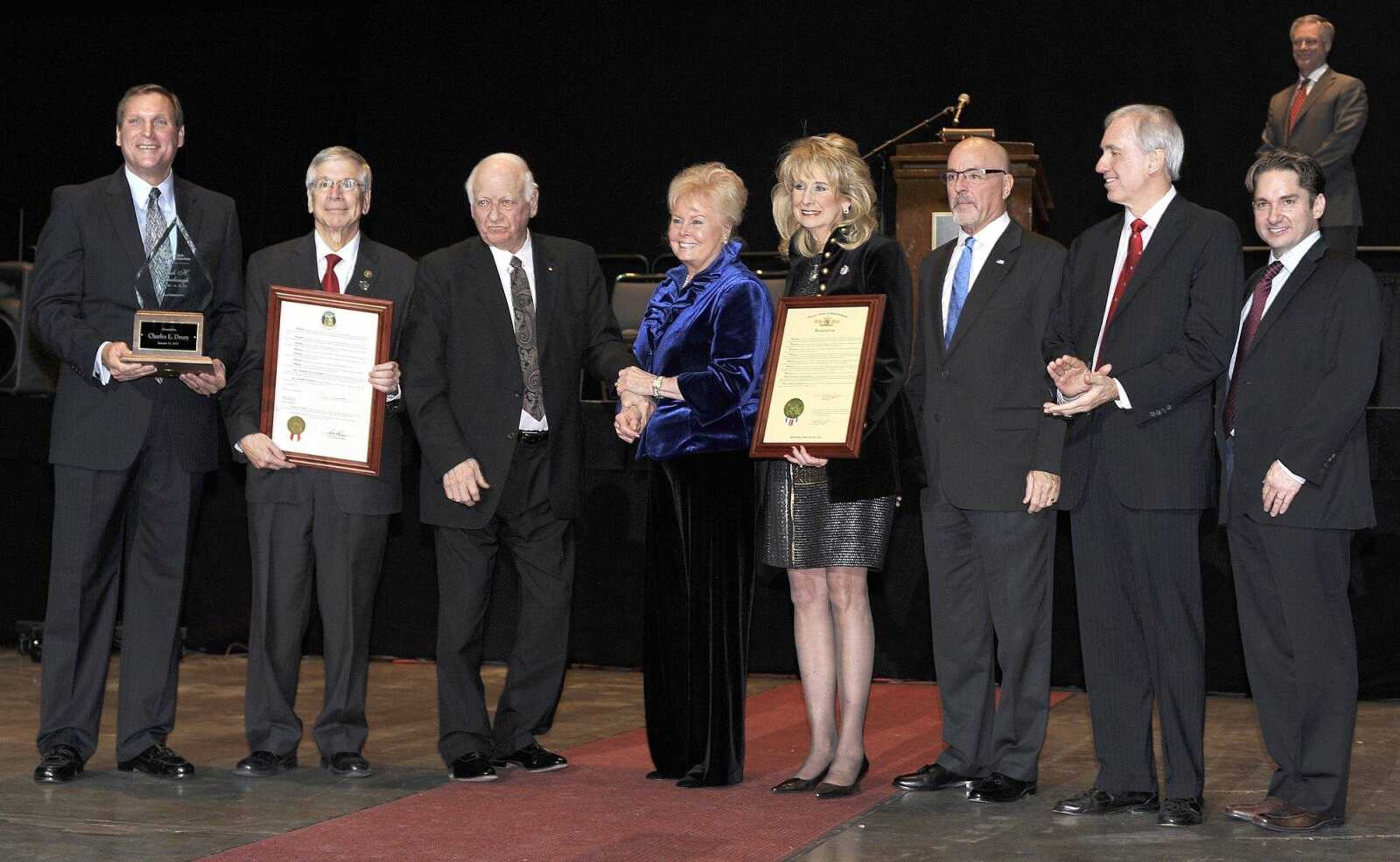 Charles L. Drury, a founder of Drury Hotels, was presented the Rush H. Limbaugh Award by the Cape Girardeau Area Chamber of Commerce at its annual dinner Friday at the Show Me Center. From left are Bob Neff, outgoing chairman; state Sen. Wayne Wallingford, Drury and his wife, Shirley; state Rep. Kathy Swan, Jim Limbaugh, David Limbaugh and Jon K. Rust, incoming chamber chairman.