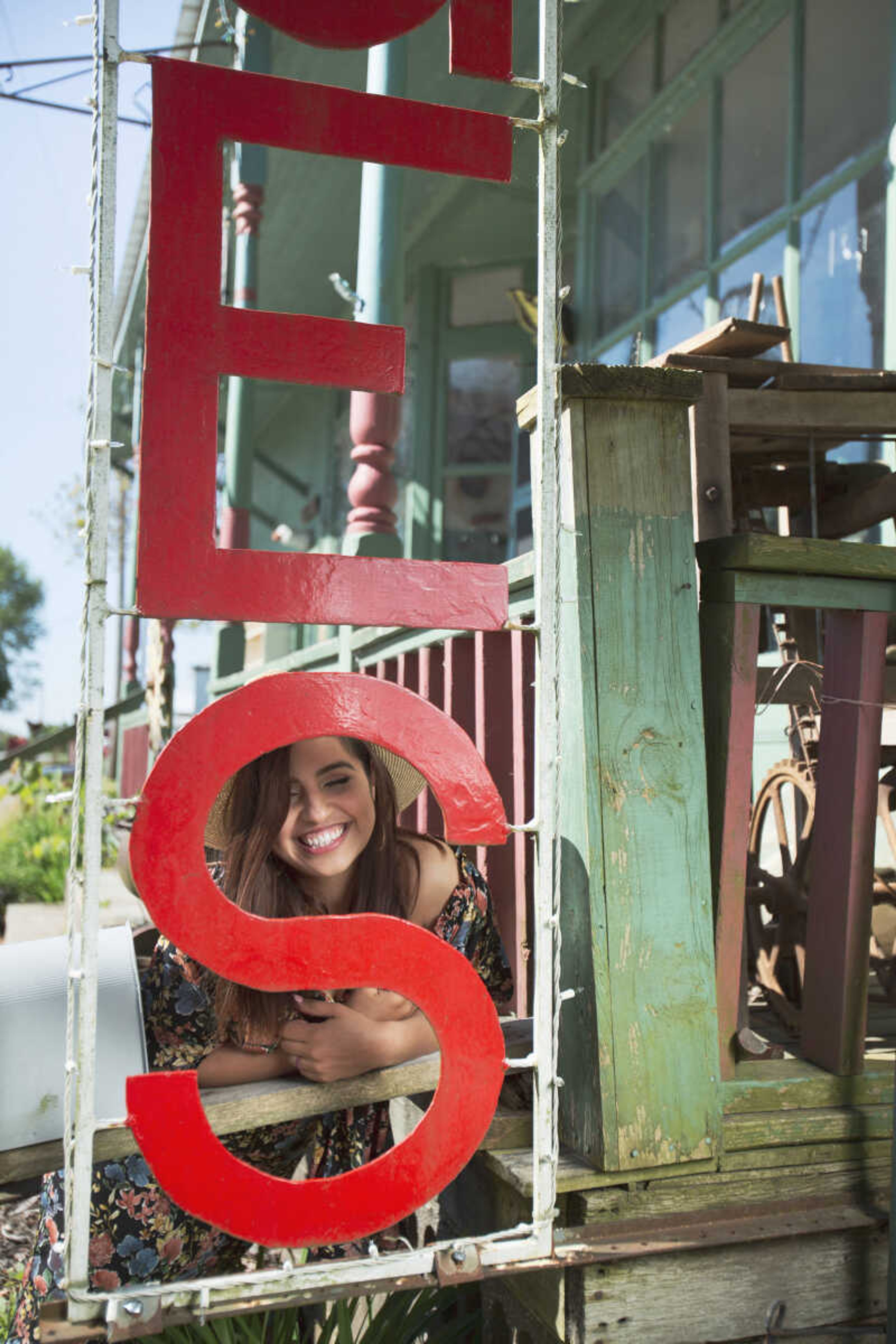 Vania Johnson models clothes, jewelry and shoes from Stash in Cape Girardeau.