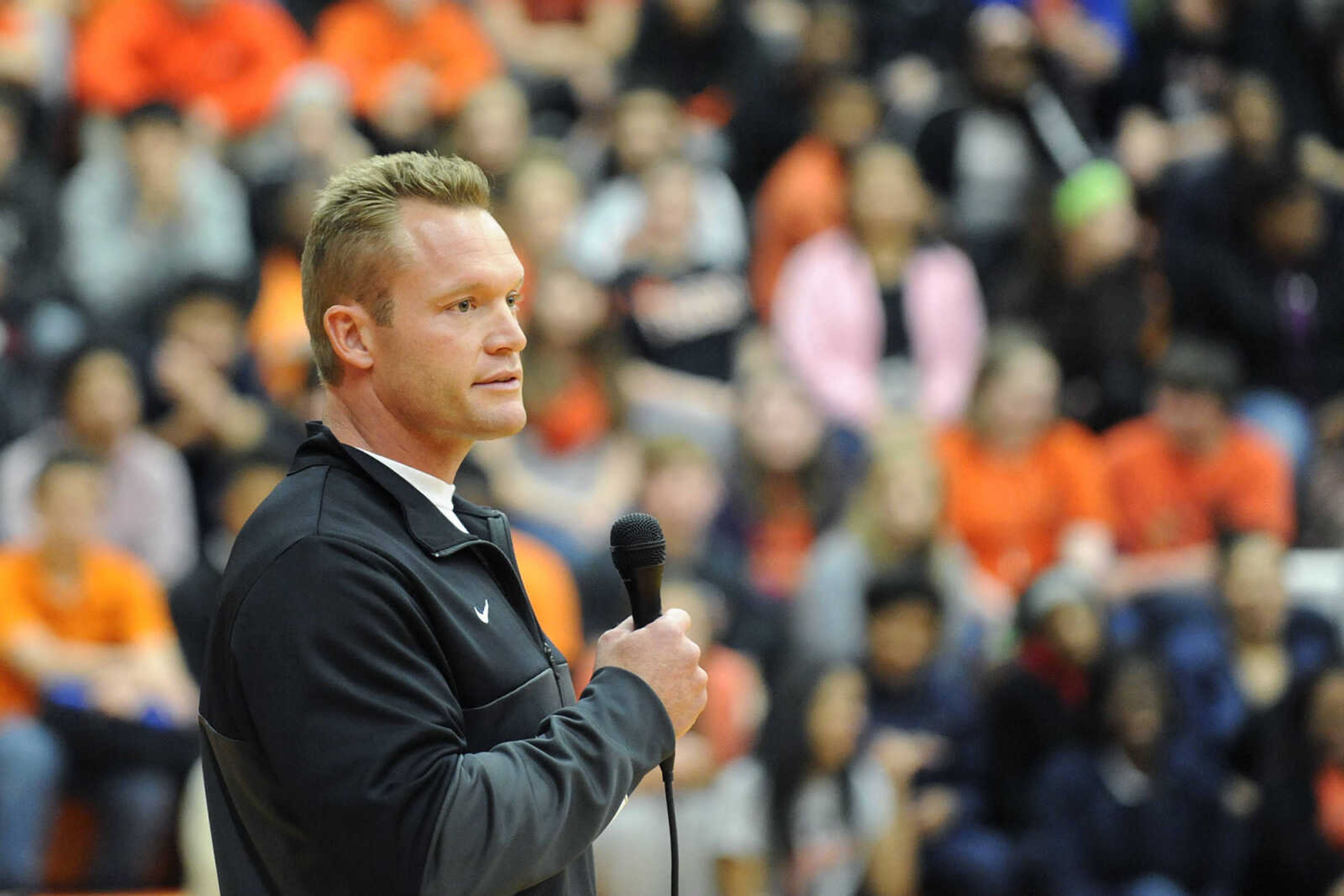 Central football coach Nathan Norman addresses students during a pep assembly at Cape Central High School Tuesday, Nov. 25, 2014. (Glenn Landberg)