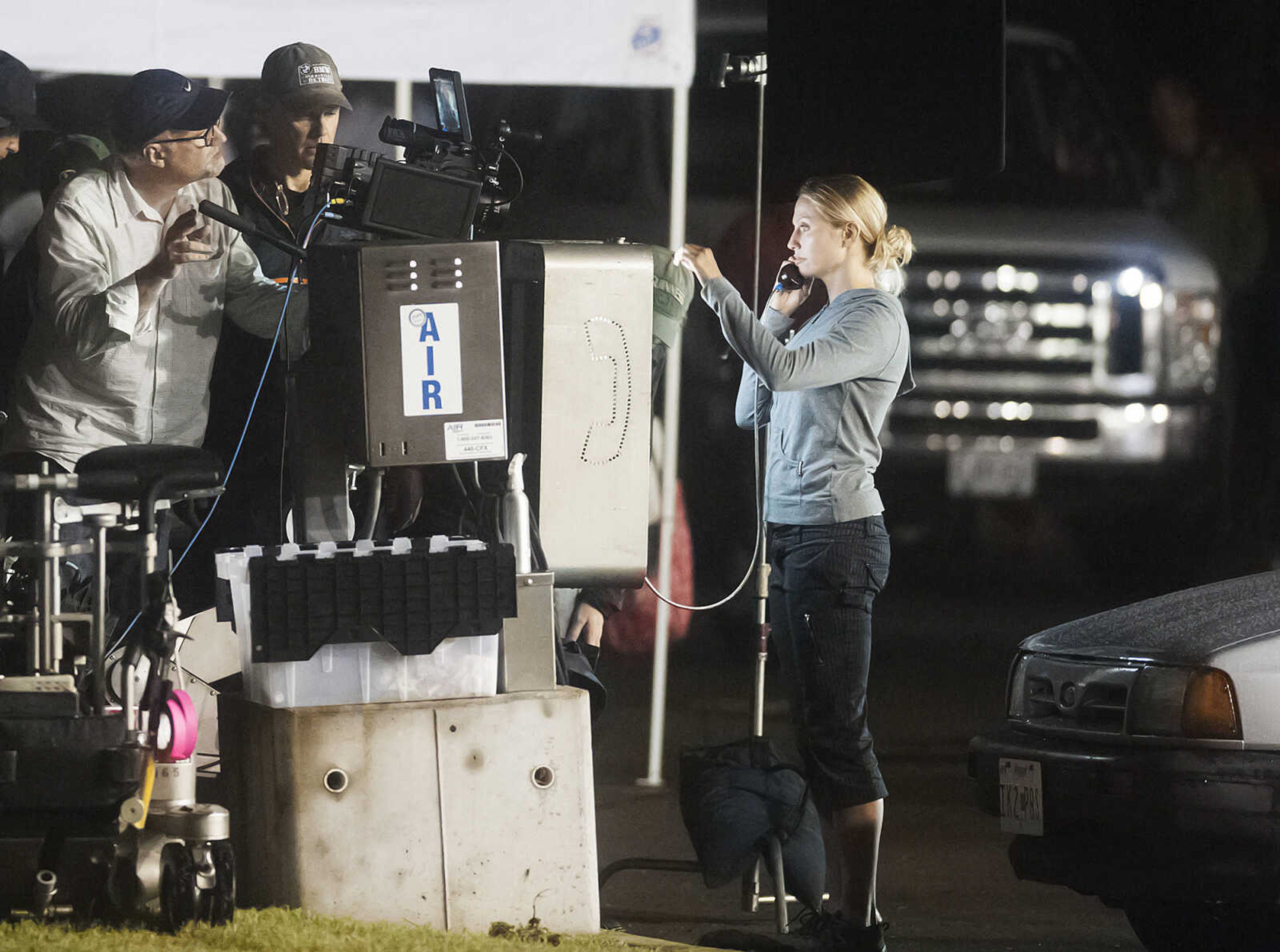 ADAM VOGLER ~ avogler@semissourian.com
A man believed to be director David Fincher sets up a shot on the set of "Gone Girl," Friday, Sept. 20, at the Rhodes 101at 546 S. Sprigg St. in Cape Girardeau. Pike plays Amy Dunne in the film which is based on a novel of the same name by Gillian Flynn.