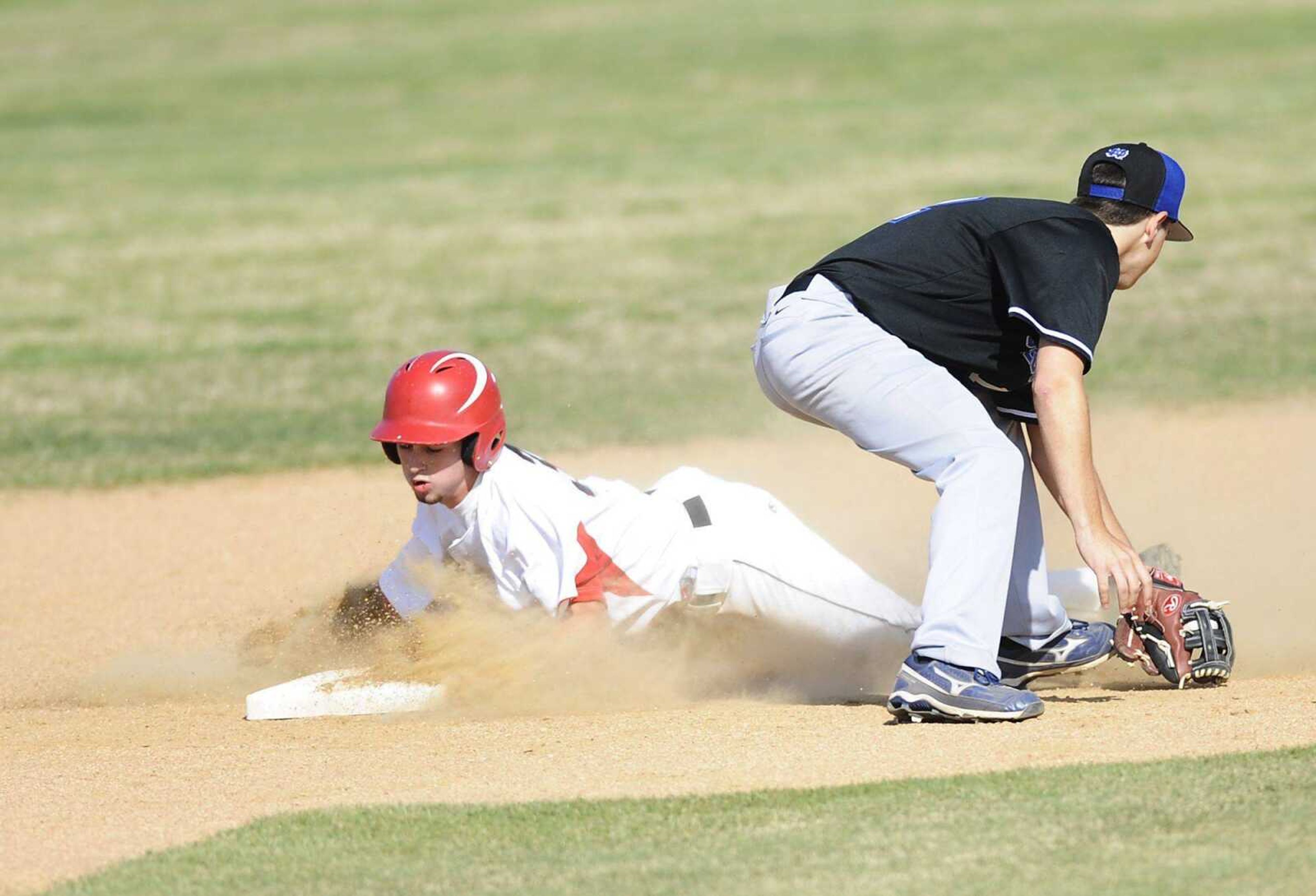 Jackson baserunner Ryan O'Rear slides into second during the Indians' 5-4 win over Notre Dame on Tuesday in Jackson. More photos can be viewed at semoball.com. (ADAM VOGLER)