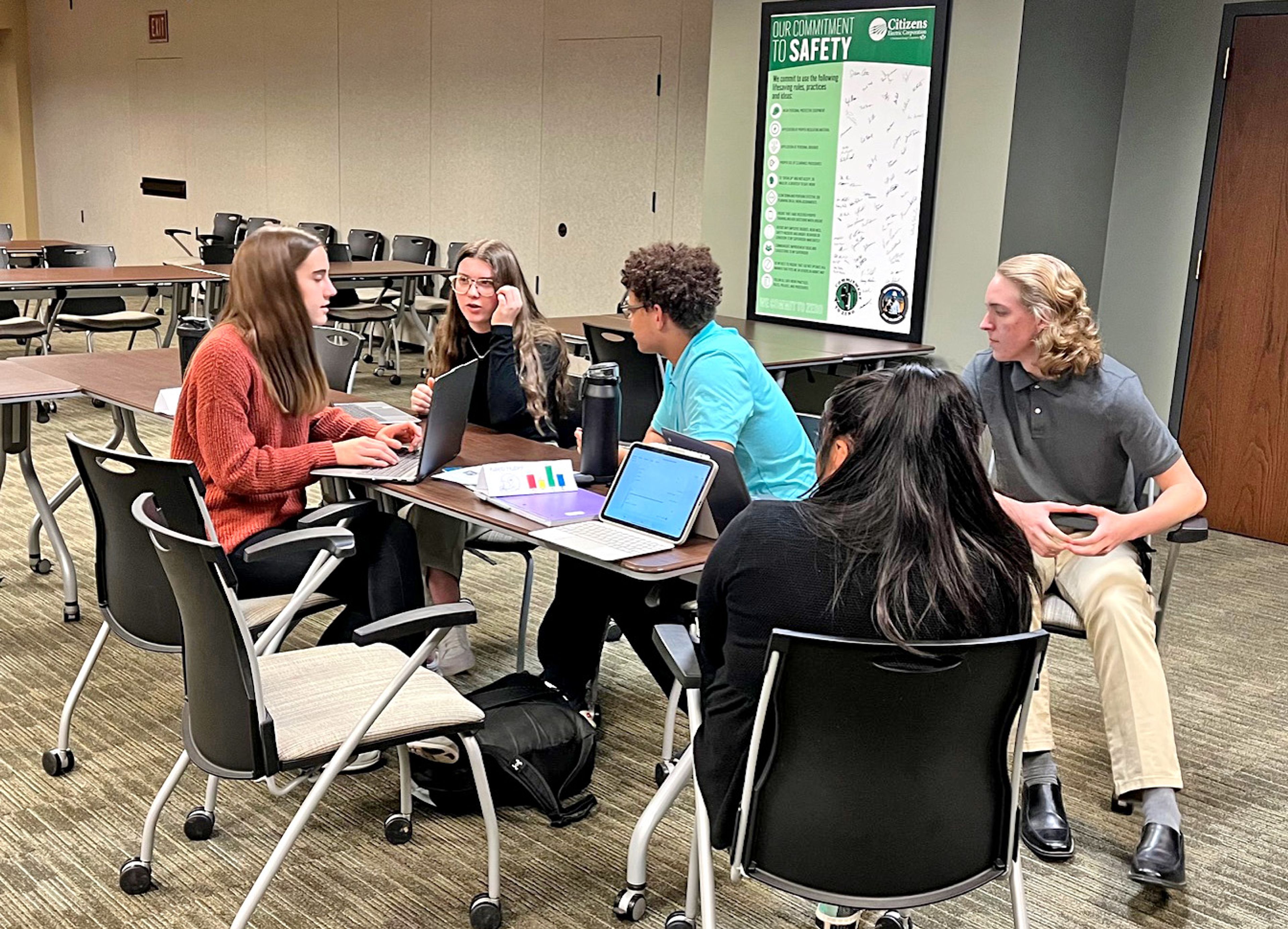 From left, Adalina Deckard, Samantha Tomlinson, Kaleb Huber, Marilisa Lopez-Herrera and Marcas Smith, who are enrolled in the Perryville Area CEO Program, plan their startup businesses at Perryville High School.