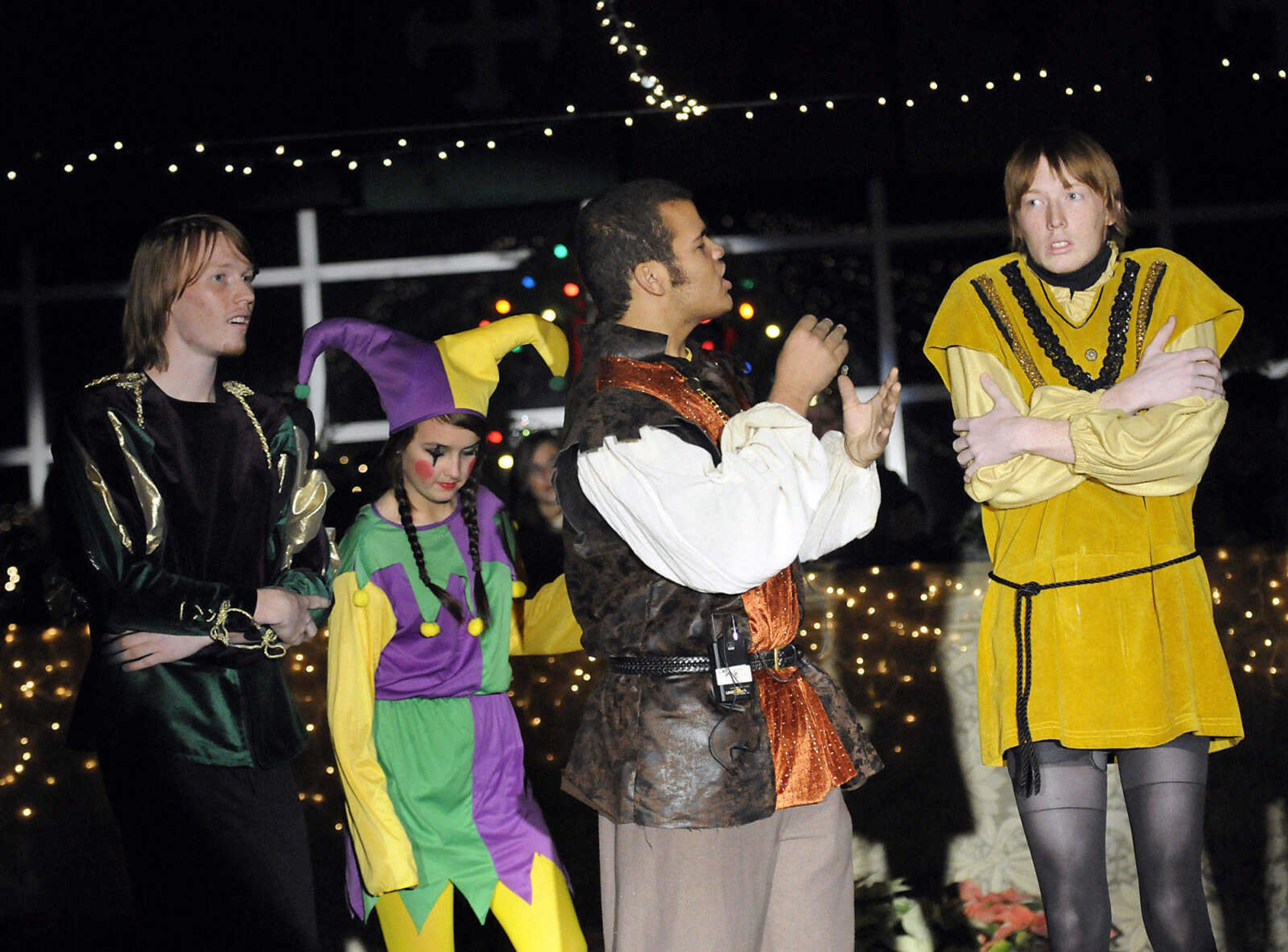 KRISTIN EBERTS ~ keberts@semissourian.com

From left, Chris Marsyla and Hannah Bagot watch as Brandon Wells "hypnotizes" Taylor Marsyla during the Central High School Choral Department's "Ye Olde Yuletide Madrigal Feaste," on Friday, Dec. 10, 2010, in Cape Girardeau. Students provided singing, food and entertainment as they transported guests back to Christmas in Renaissance England.