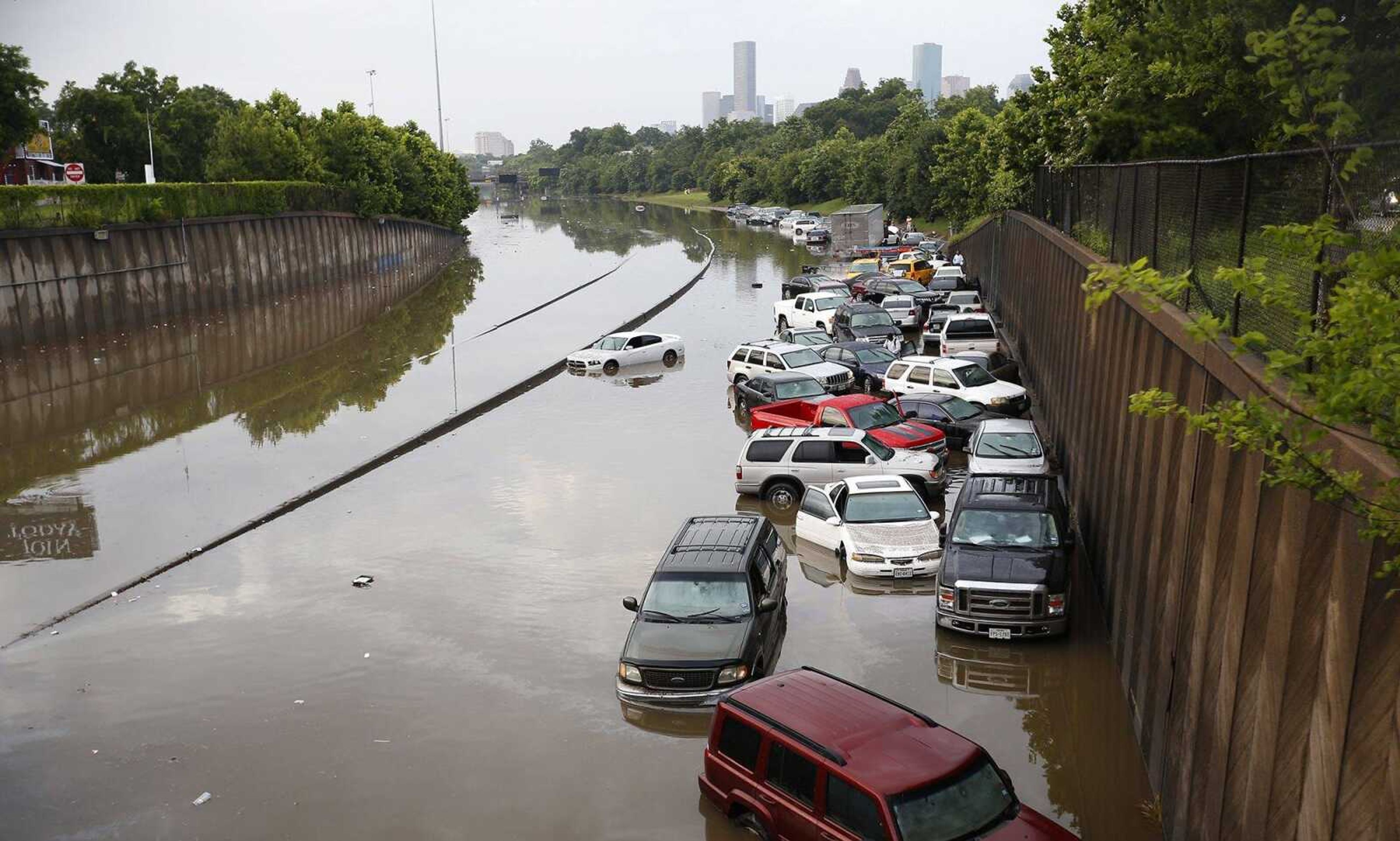 Motorists are stranded on Interstate 45 along North Main in Houston after storms flooded the area Tuesday. Overnight heavy rains caused flooding, closing some portions of major highways in the Houston area. (Cody Duty ~ Houston Chronicle)