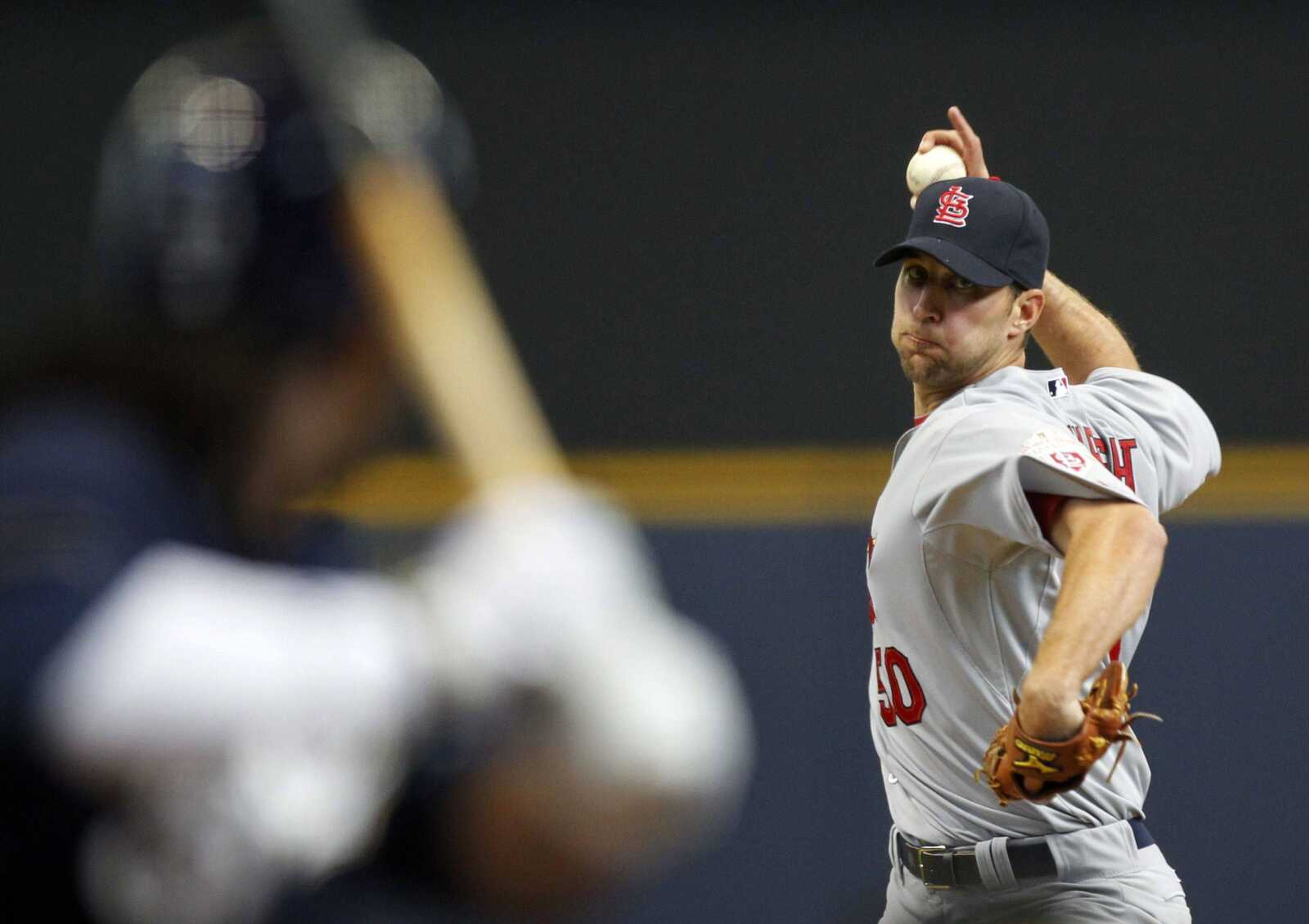 Cardinals starting pitcher Adam Wainwright delivers during the first inning Saturday in Milwaukee. (JEFFREY PHELPS ~ Associated Press)