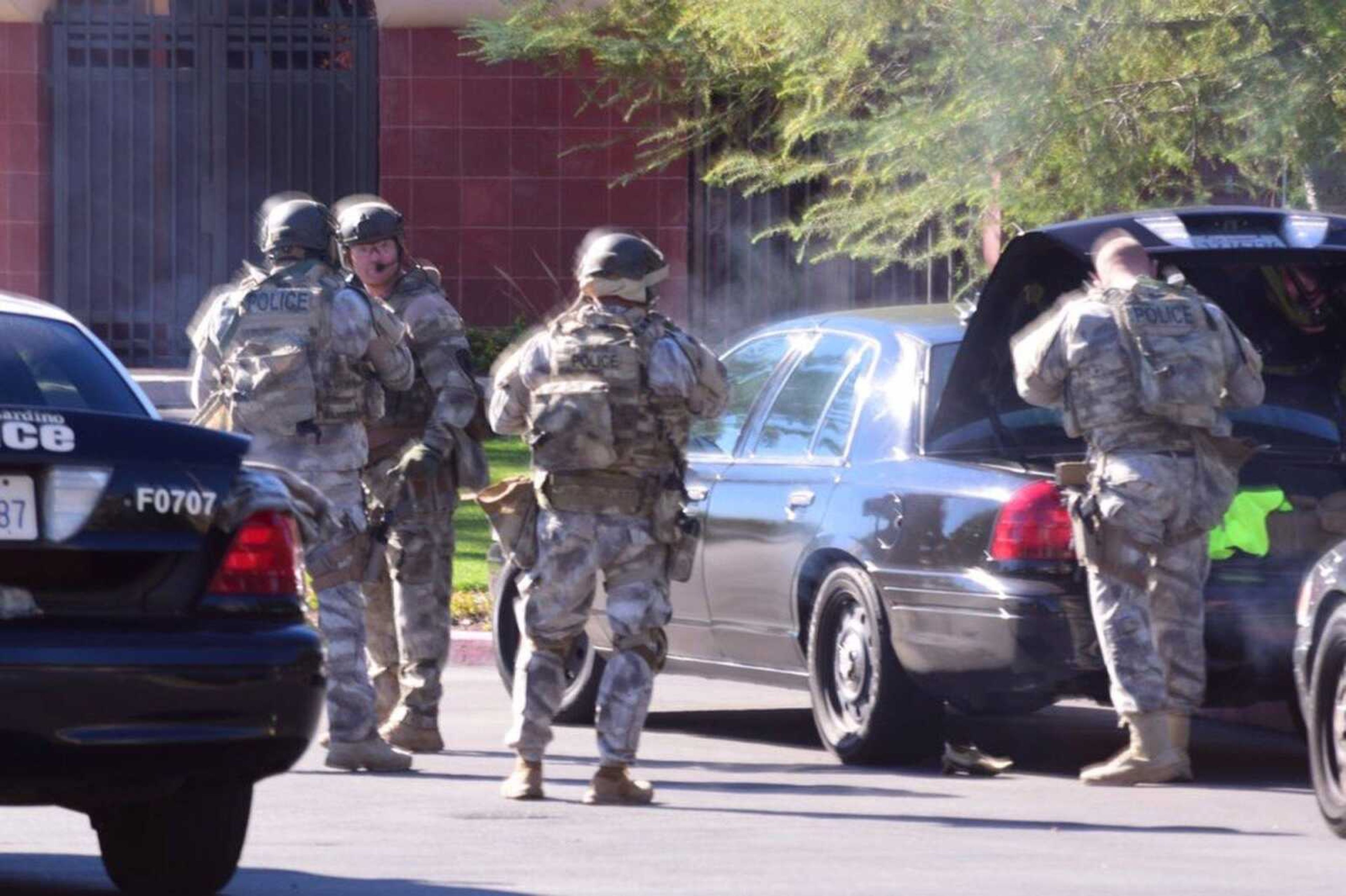 A swat team arrives at the scene of a shooting Wednesday in San Bernardino, California. Police responded to reports of an active shooter at a social-services facility. (Doug Saunders ~ Los Angeles News Group via AP)