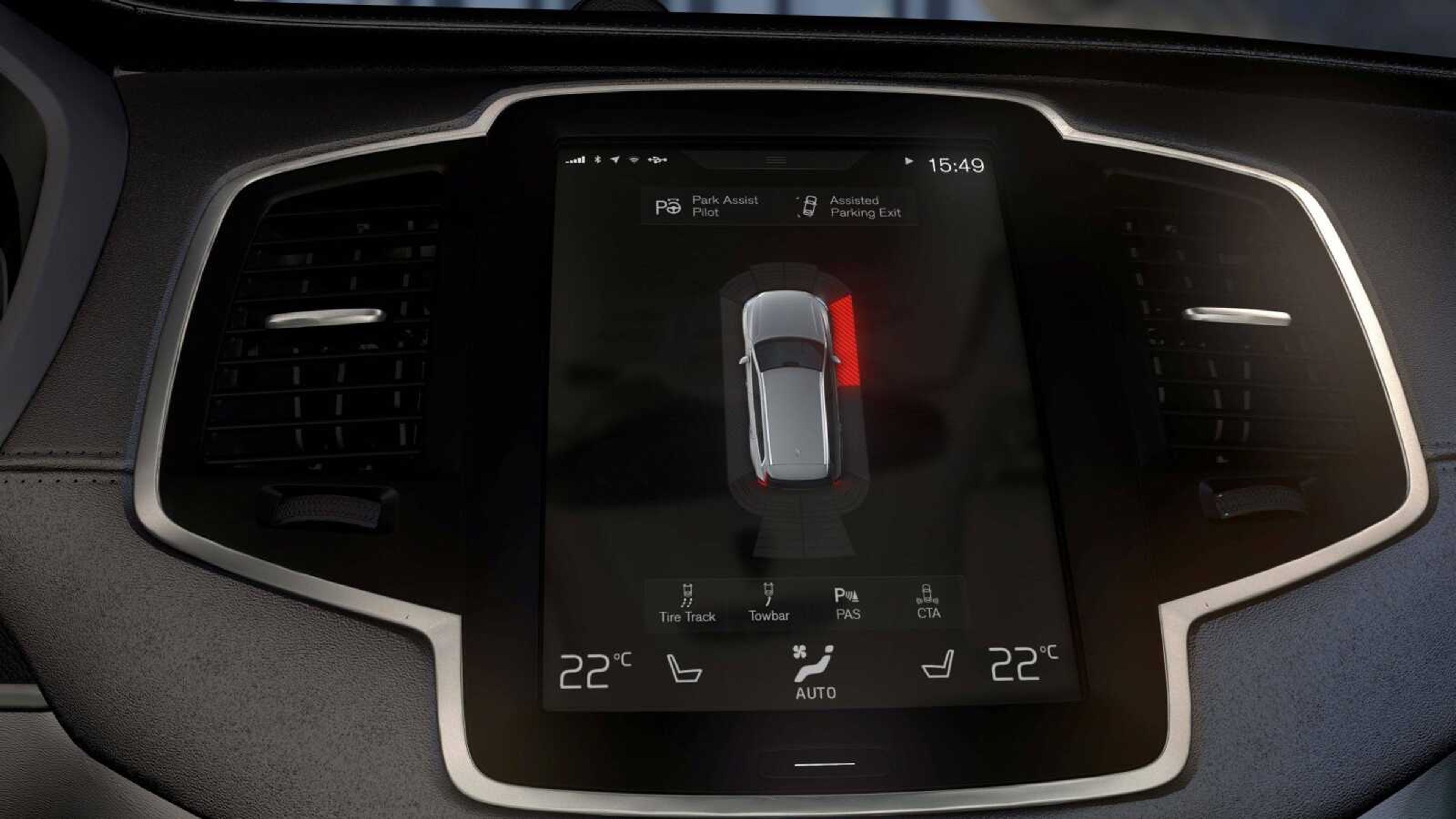 This undated photo provided by Volvo Cars shows the carmaker's Park Assist System in one of their XC90 SUVs. The system supports the driver during parking. The function expresses audible and visible output to help the driver determine the distance to stationary and moving objects during parking. It uses four front and four rear ultrasonic sensors positioned symmetrically left to right on the front and rear bumper. An additional four sensors are positioned at the front and rear wheel housing to scan the side of the vehicle.