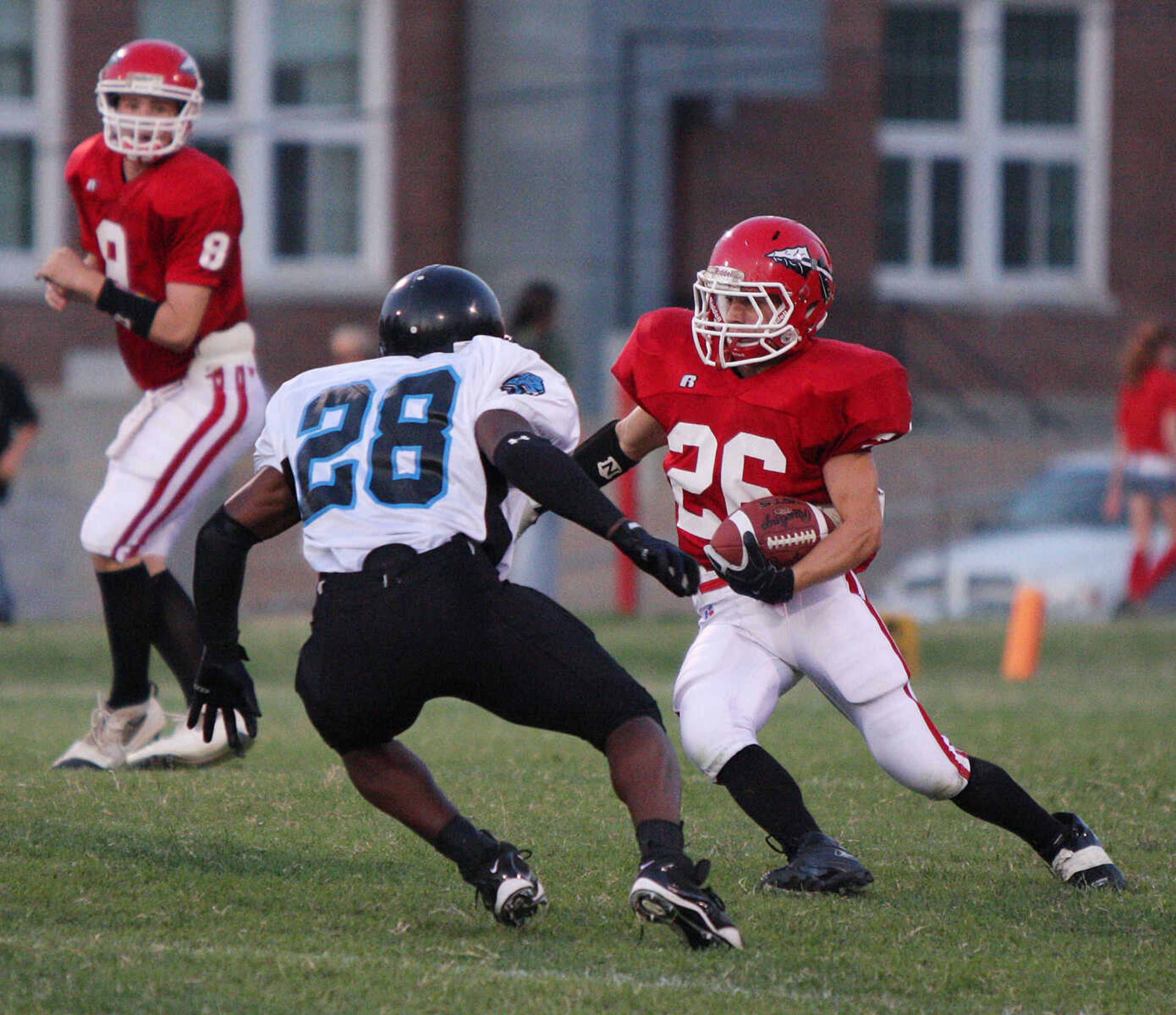 Jackson's Stetson Proffer, right, attempts to juke Walter Watson of Gateway Tech during Friday night's game.