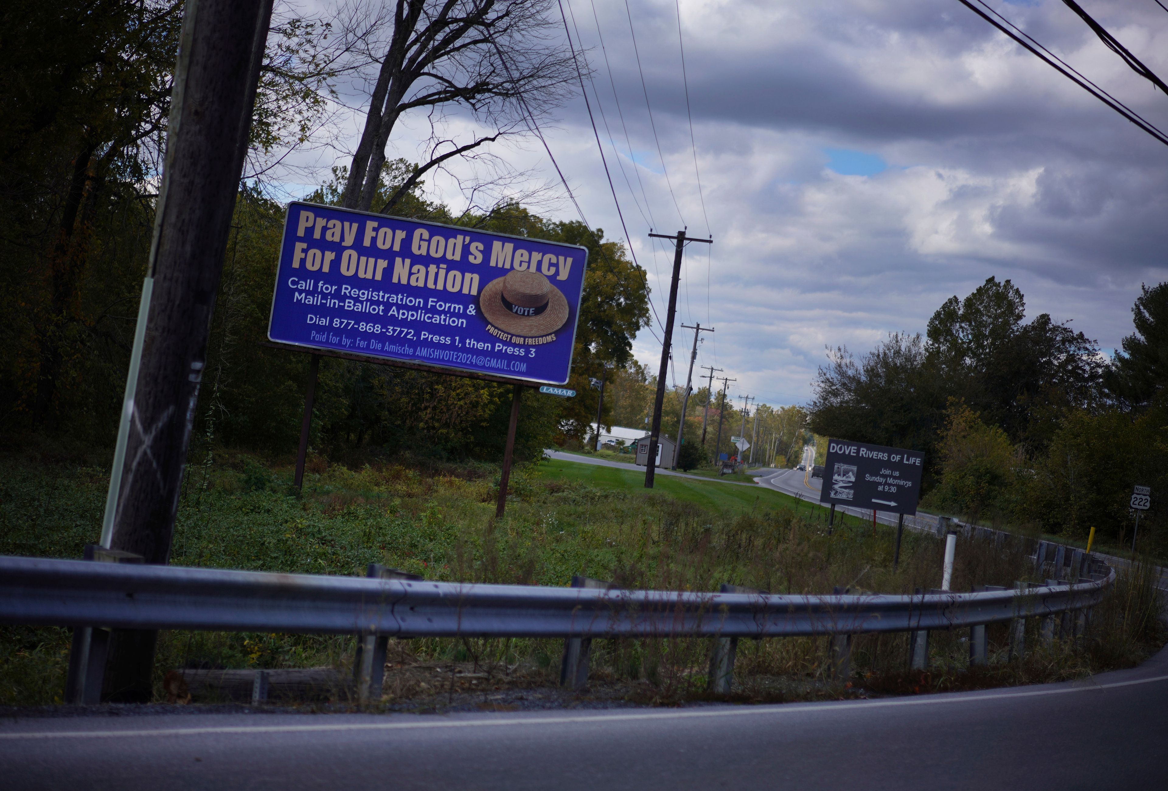 A voting advertisement geared toward the Amish population of Lancaster County is seen from the road in Strasburg, Pa., on Tuesday, Oct. 15, 2024. (AP Photo/Jessie Wardarski)