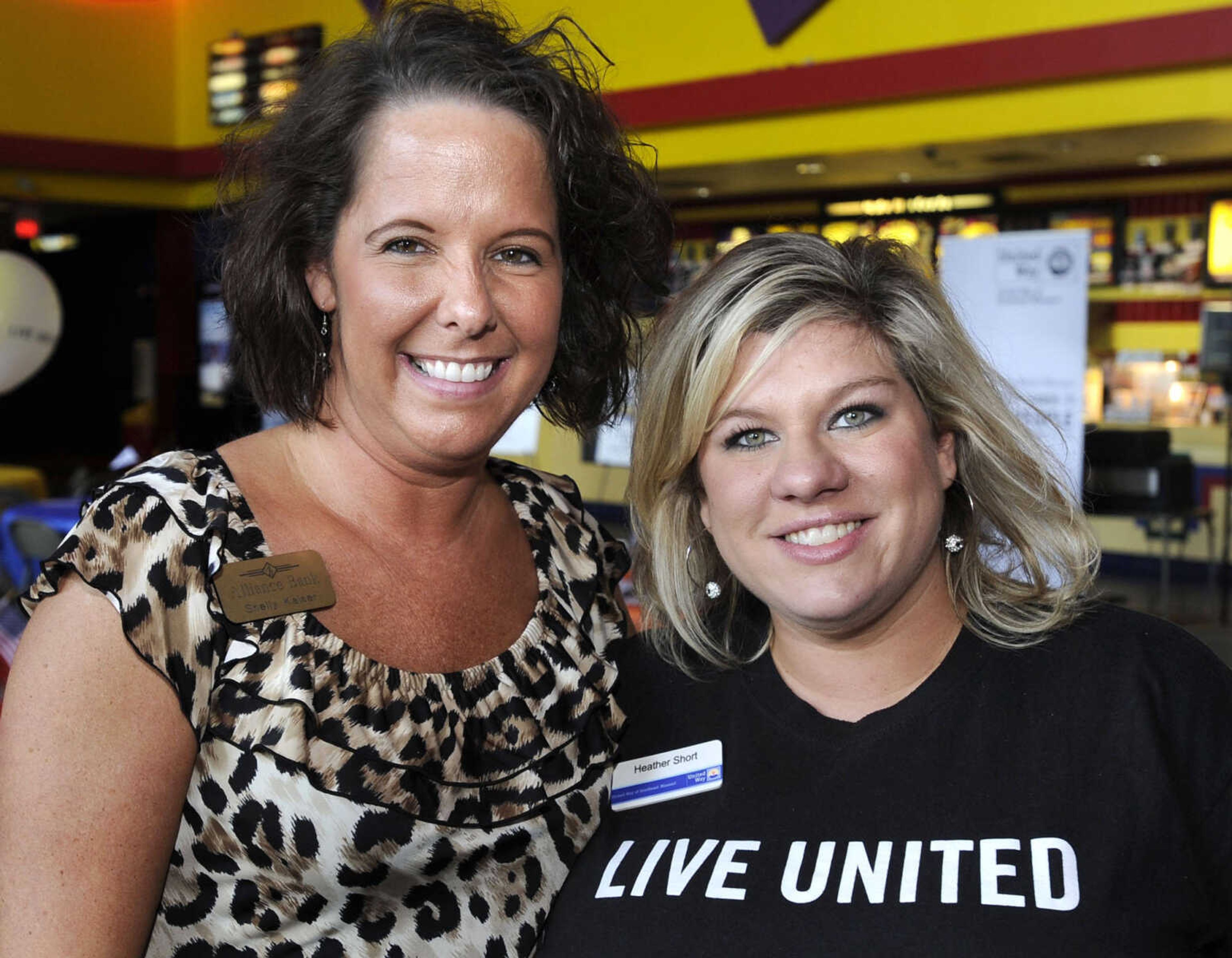 Shelly Kaiser, left, and Heather Short pose at the United Way of Southeast Missouri campaign kickoff Aug. 30 at West Park 14 Cine.