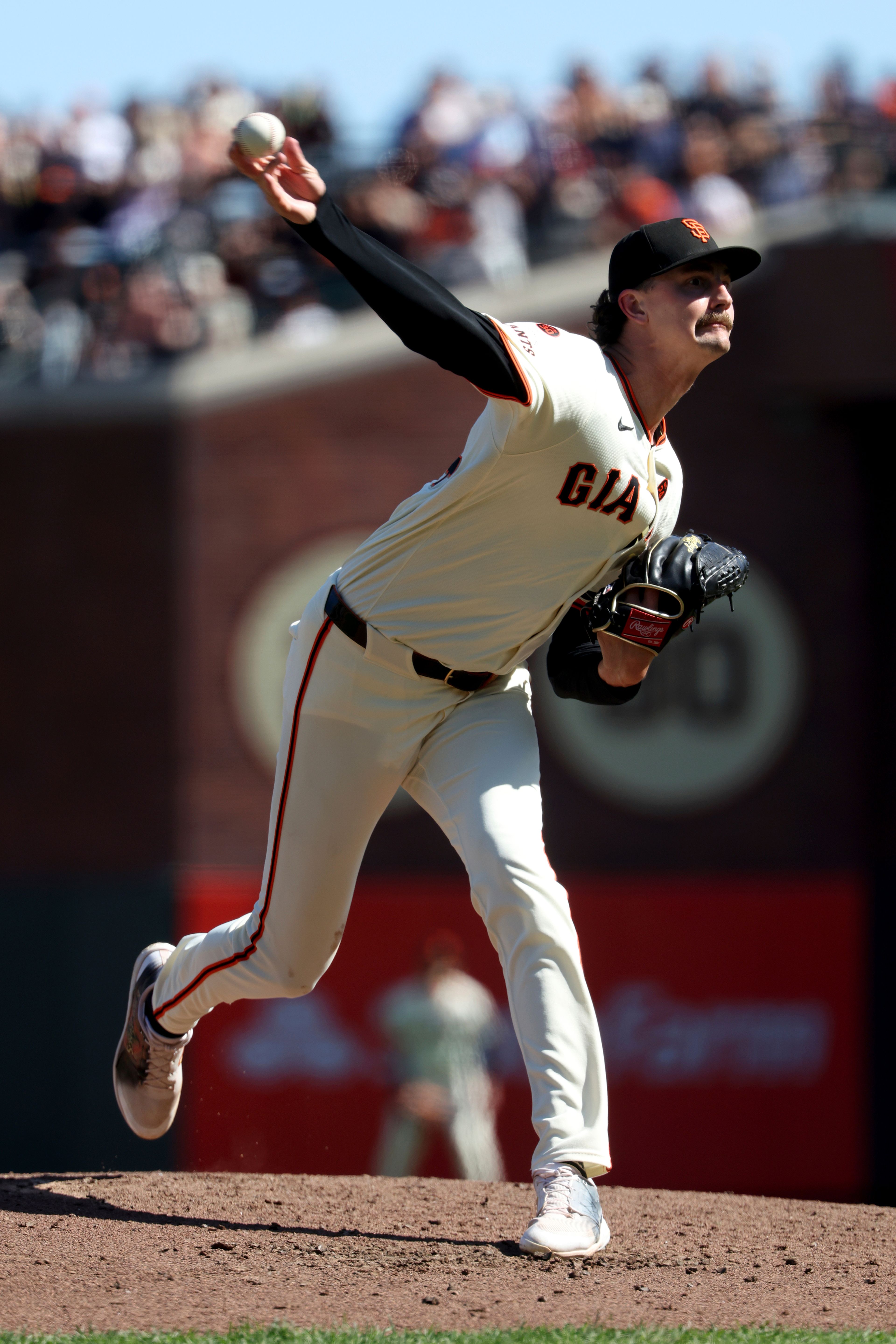 San Francisco Giants pitcher Sean Hjelle throws against the St. Louis Cardinals during the fifth inning of a baseball game in San Francisco, Saturday, Sept. 28, 2024. (AP Photo/Jed Jacobsohn)