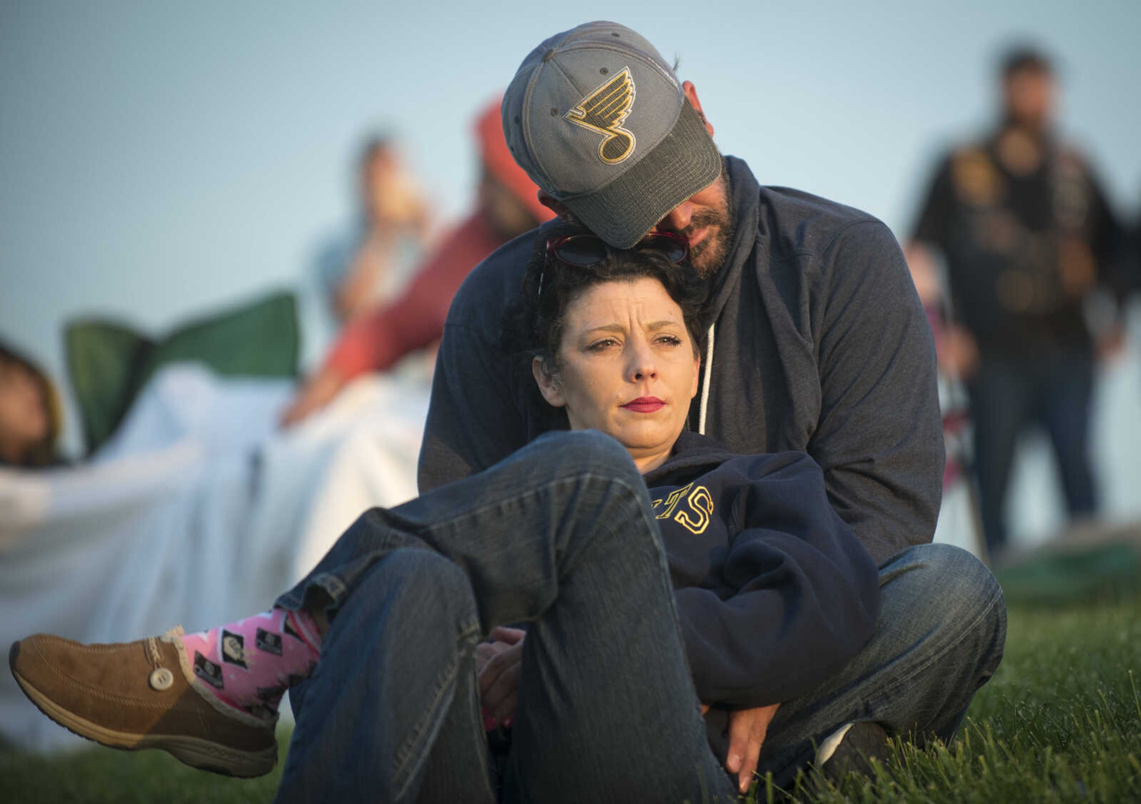 Billy Jeffords rests his head on Kristy Jeffords during the 81st annual Easter Sunrise Service at the Bald Knob Cross of Peace Sunday, April 16, 2017 in Alto Pass, Illinois.