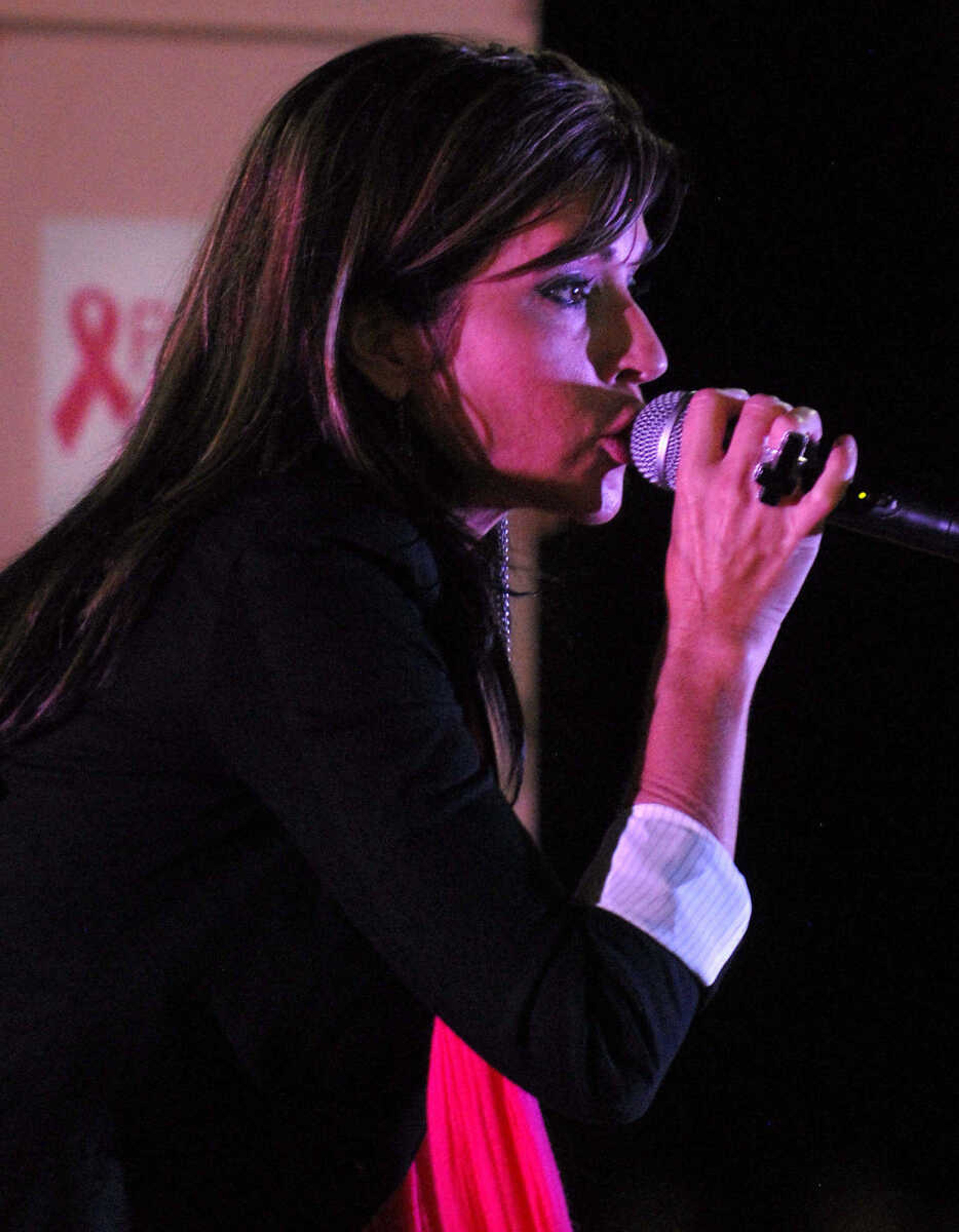 LAURA SIMON ~ lsimon@semissourian.com
Dexter, Mo. native Candy Coburn performs her song "Pink Warrior" Wednesday, September 28, 2011 during the Pink Up Cape celebration at Saint Francis Medical Center in Cape Girardeau. The celebration kicks off Breast Cancer Awareness Month.