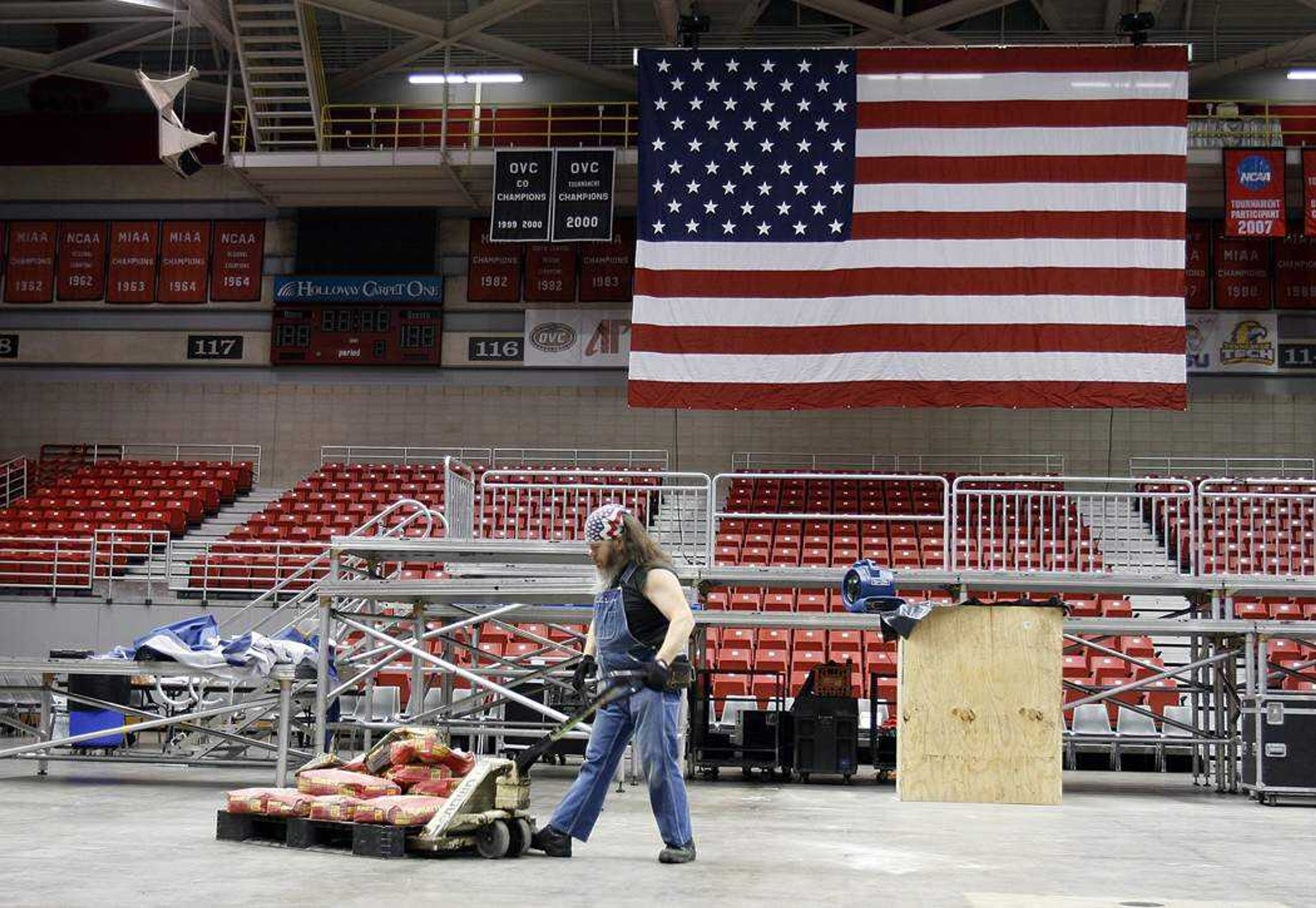 ELIZABETH DODD ~ edodd@semissourian.com
Will Myers, of Chaffee, clears the floor of the Show Me Center on Wednesday in preparation for the Sarah Palin rally Thursday morning.