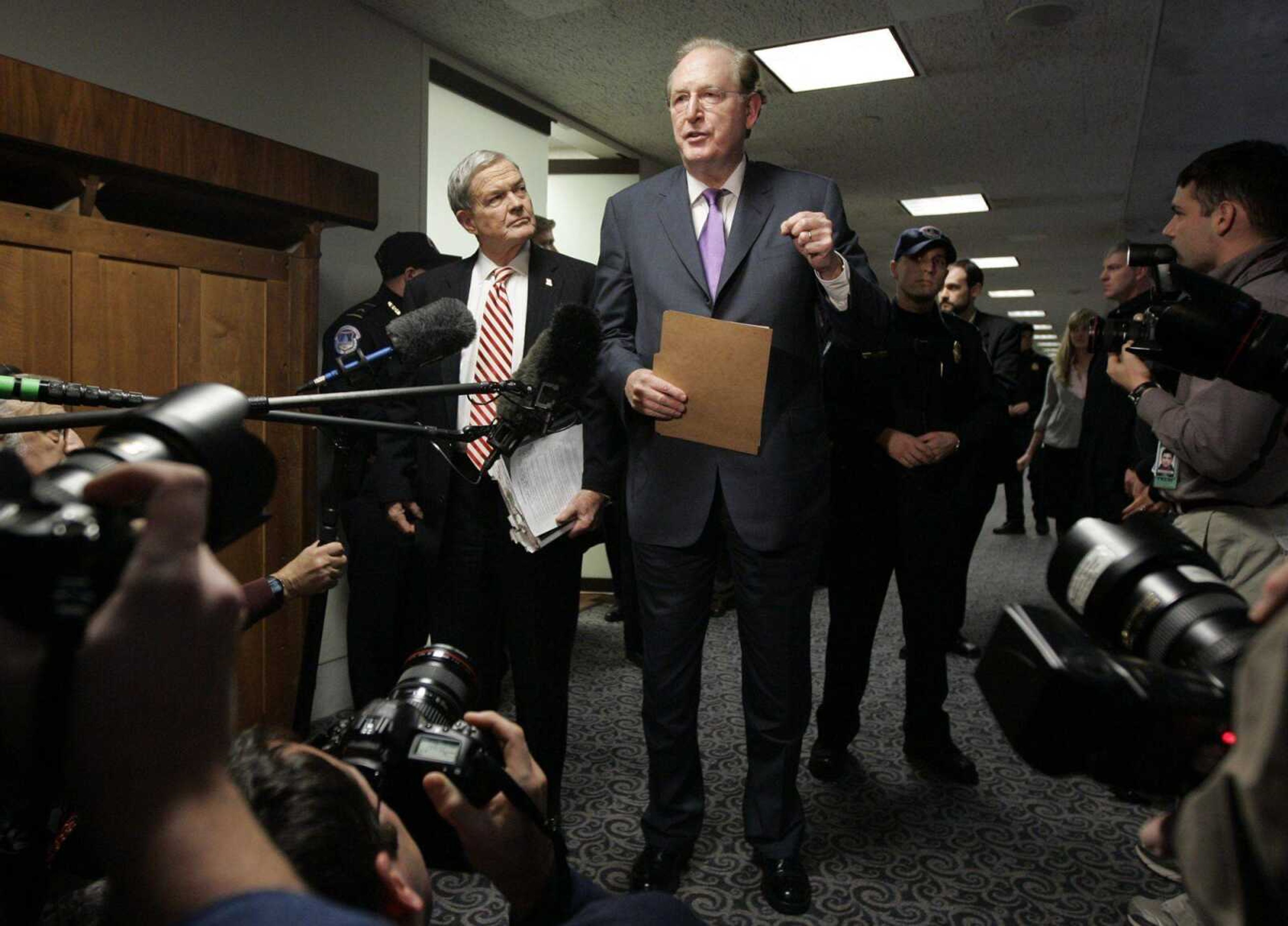 Senate Intelligence Committee chairman Sen. John D. Rockefeller IV, D-W.V., center, accompanied by Sen. Kit Bond, R-Mo., ranking Republican on the committee, talked to reporters Tuesday on Capitol Hill in Washington, D.C., following a closed-door briefing by Central Intelligence Agency director Gen. Michael Hayden on the destroyed CIA interrogation tapes. (Susan Walsh ~ Associated Press)