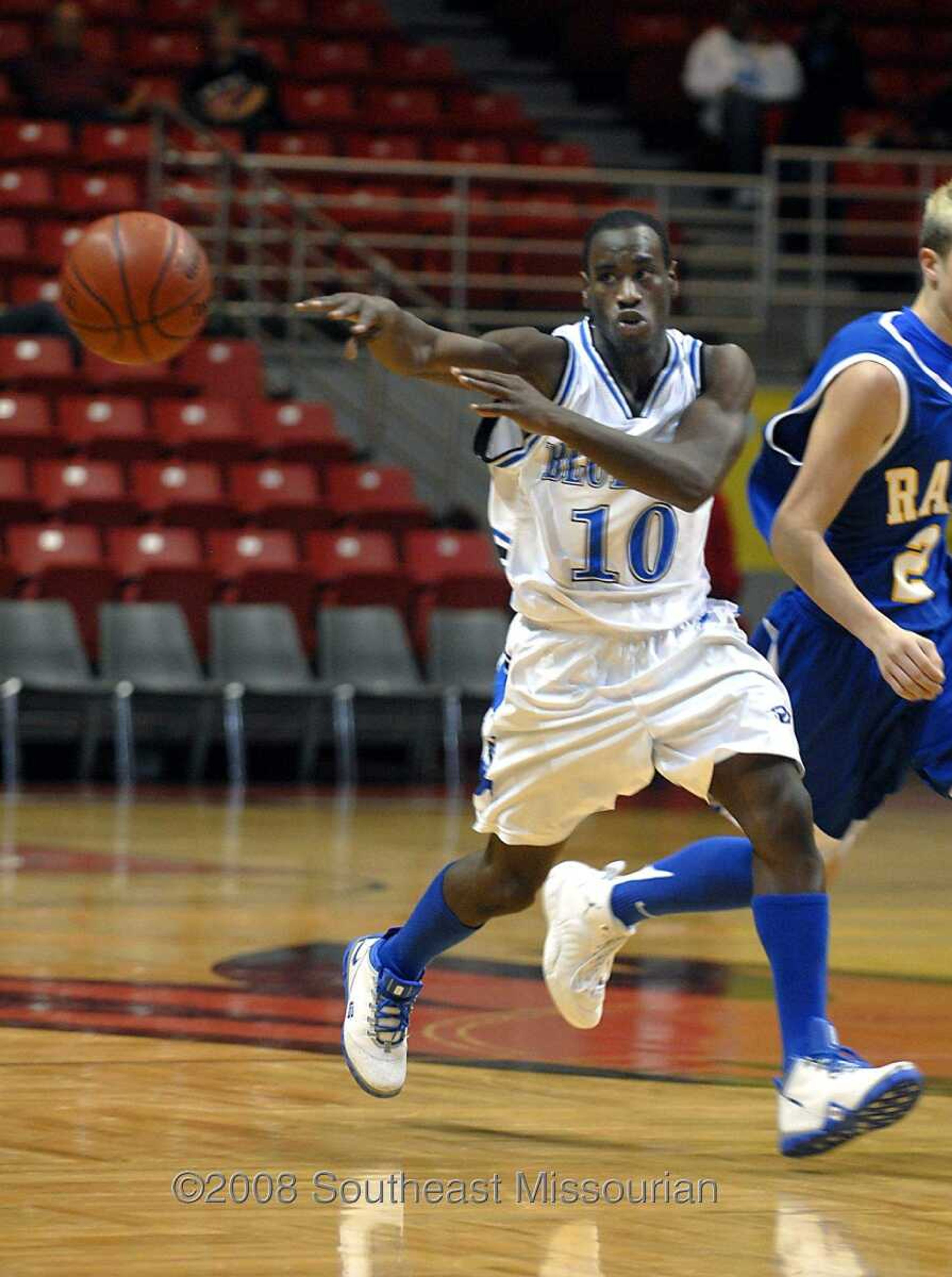 KIT DOYLE ~ kdoyle@semissourian.com
Charleston senior Antonio Riggens passes Friday, December 26, 2008, in the first round of the Southeast Missourian Christmas Tournament at the Show Me Center.