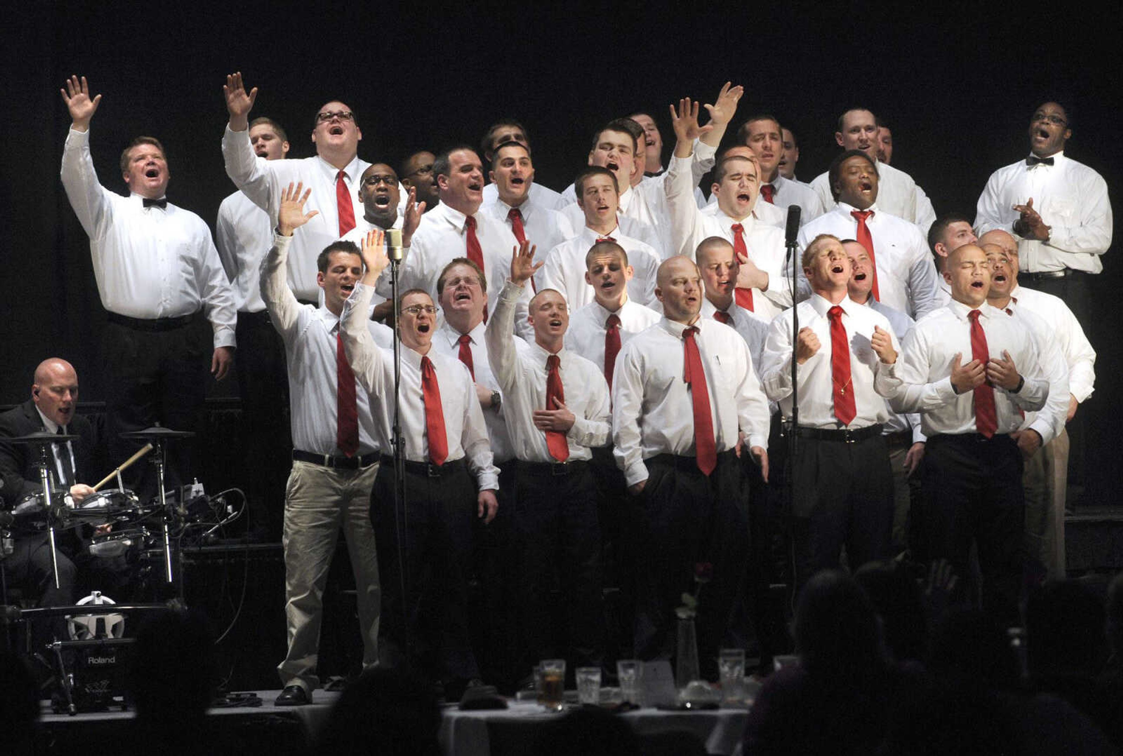 The Teen Challenge Mid America Choir sings "All Because of Jesus" at the ministry's annual banquet Saturday, April 13, 2013 at the Show Me Center. (Fred Lynch)