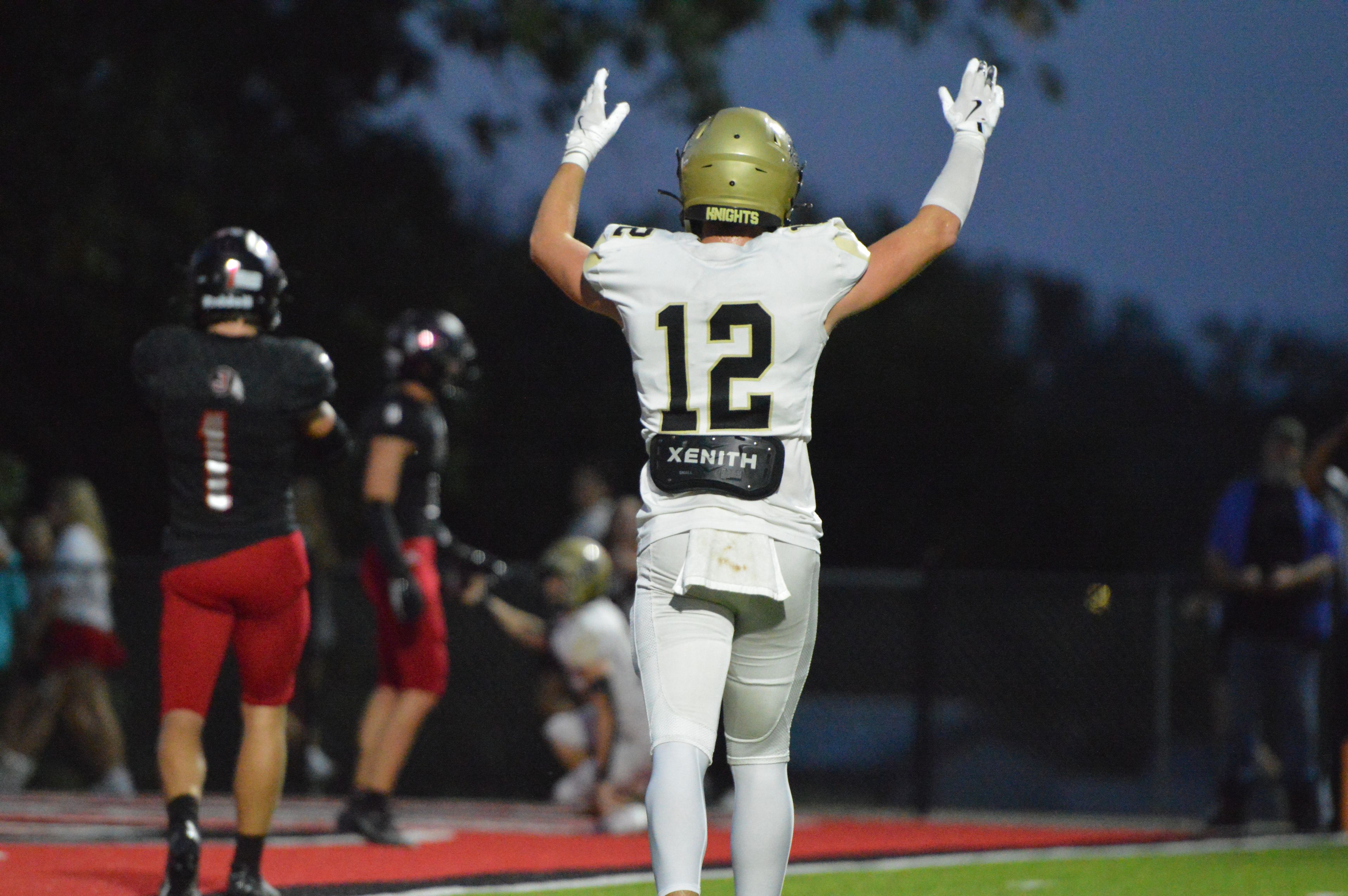 Farmington sophomore wide receiver Ian Zohner celebrates a Knight touchdown against Jackson on Friday, Sept. 20.