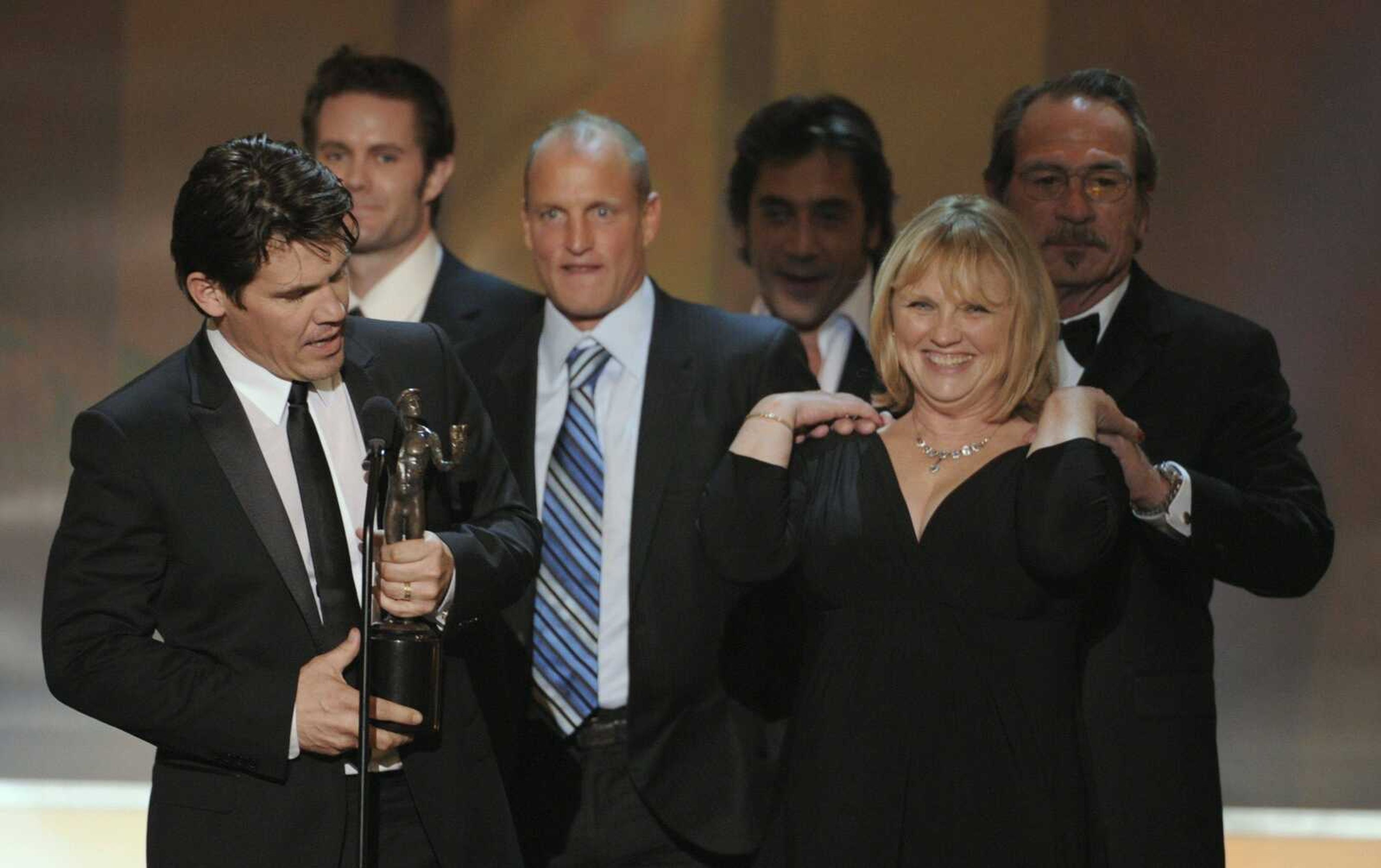 Josh Brolin and cast members, from back left, Garret Dillahunt, Woody Harrelson, Javier Bardem, Tess Harper and Tommy Lee Jones accepted the award for outstanding performance by a cast in a motion picture for their work in "No Country for Old Men" on Sunday at the 14th Annual Screen Actors Guild Awards in Los Angeles. (Mark J. Terrill ~ Associated Press)