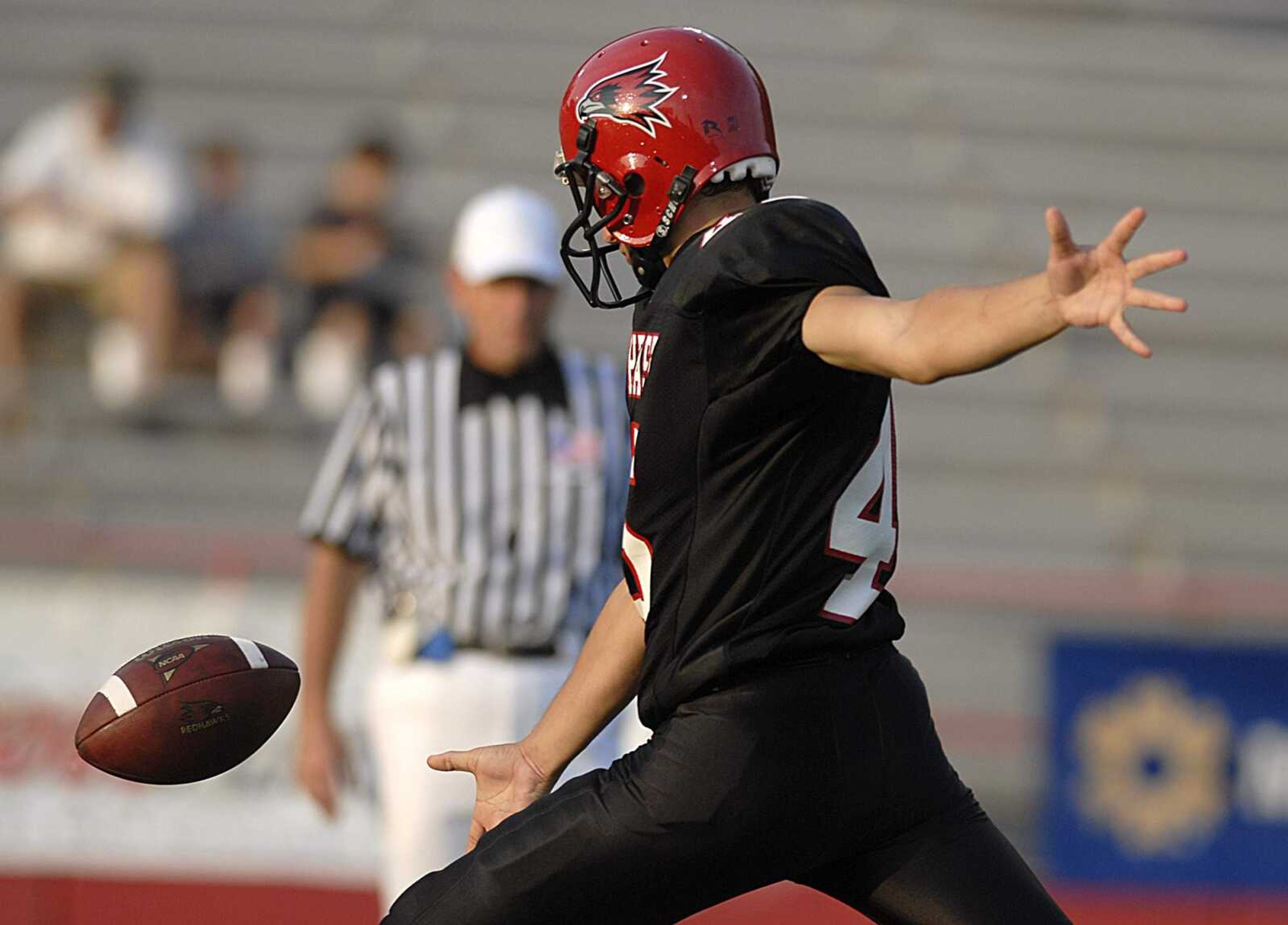 AARON EISEHAUER ~ aeisenhauer@semissourian.com
Southeast kicker Doug Spada drops the ball for a punt to Southwest Baptist University.