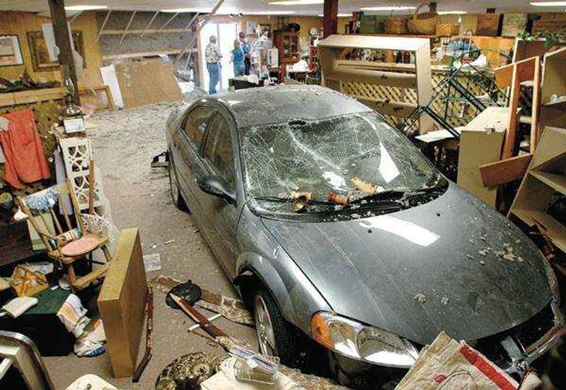 Car plows into Benton store after I55 collision