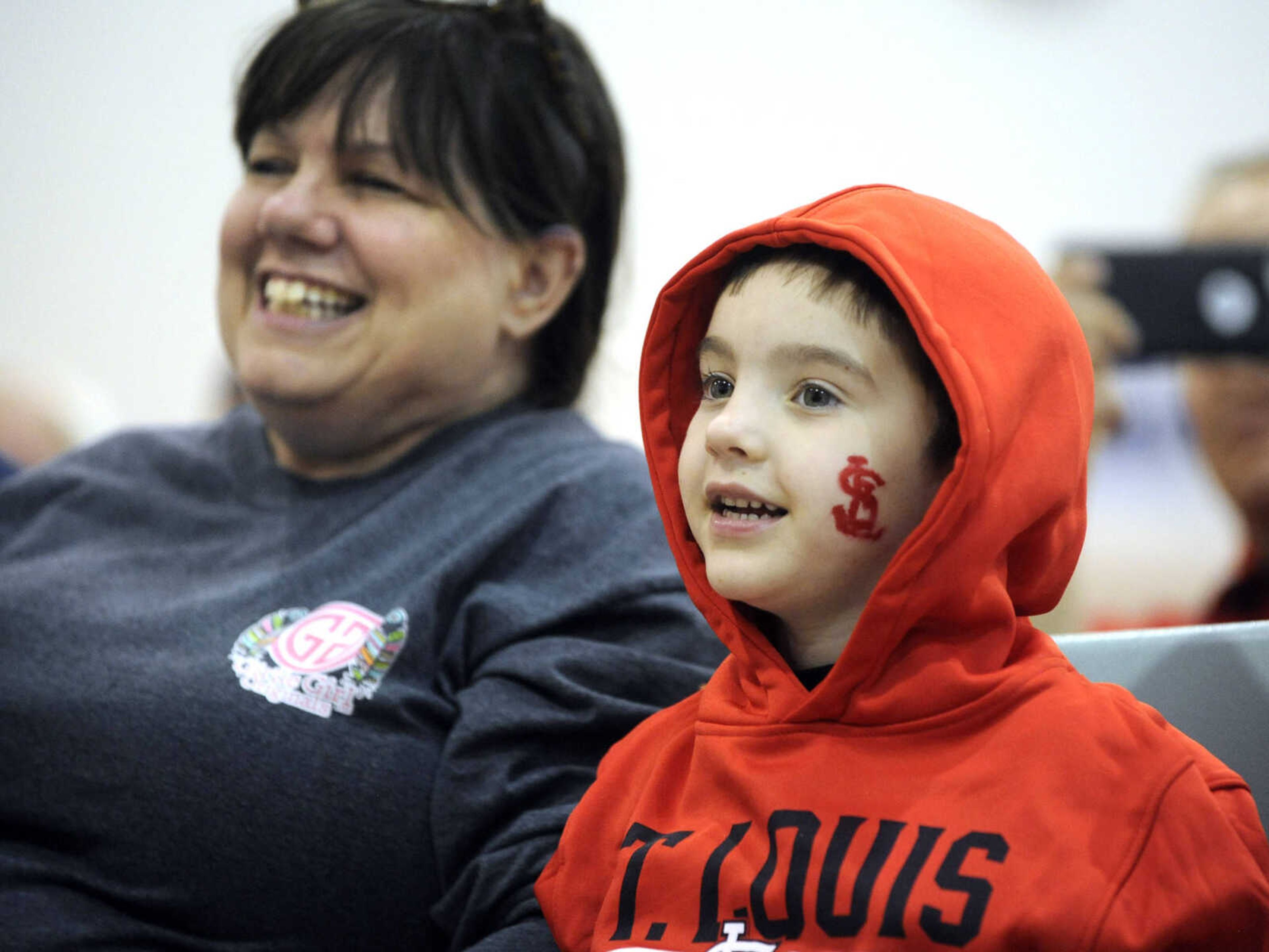 FRED LYNCH ~ flynch@semissourian.com
Will Kluesner and his grandmother, Susan King, take in the Cardinals Caravan on Monday, Jan. 16, 2017 at the Osage Centre.