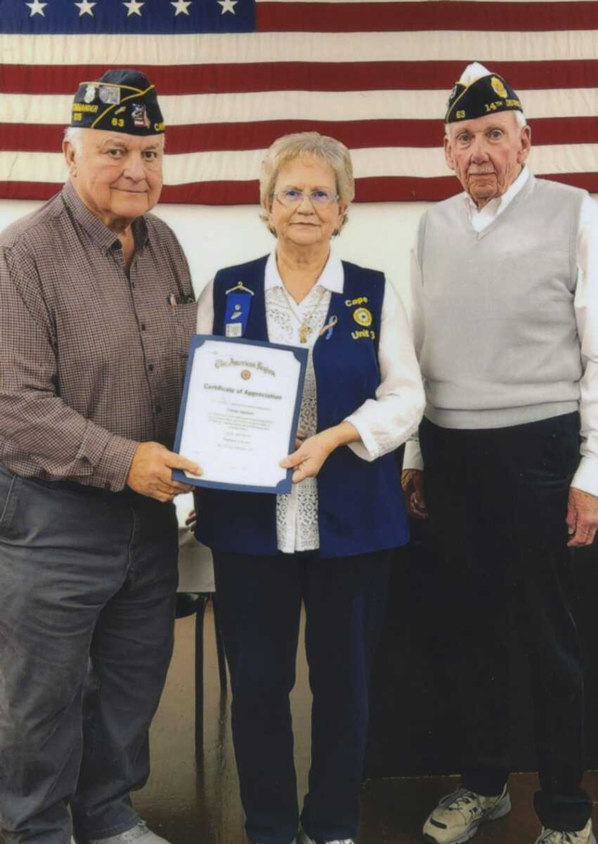 The American Legion Unit 63 in Cape Girardeau awarded Linda Sanders, auxiliary member, a certificate of appreciation. The award was presented by Dennis Wolekjte, American Legion Unit 63 chaplain, and Tom Giles, American Legion Unit 63 adjutant.