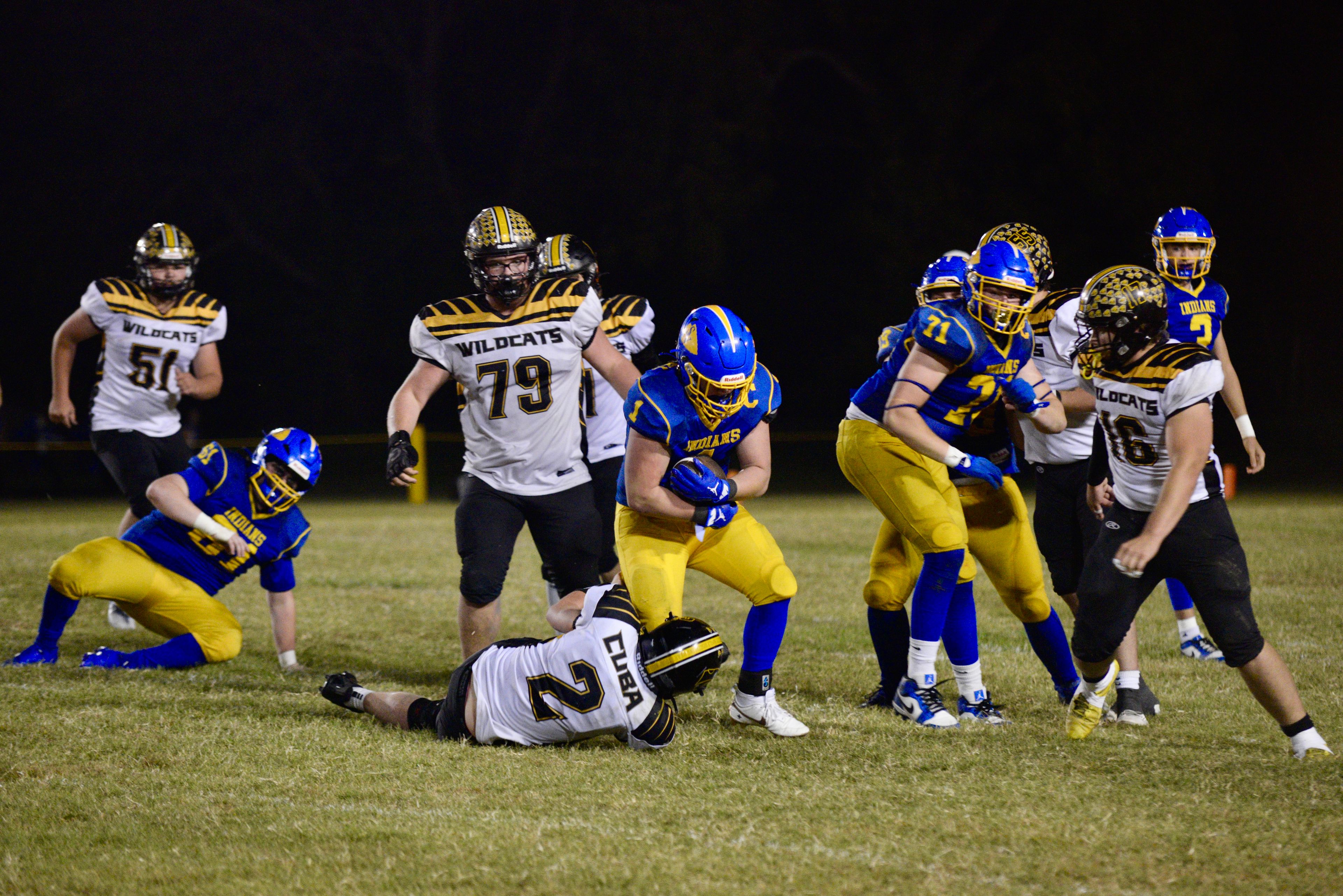 St. Vincent running back Cruz Reitzel runs through Cuba defenders on Friday, Oct. 11, in Perryville. 