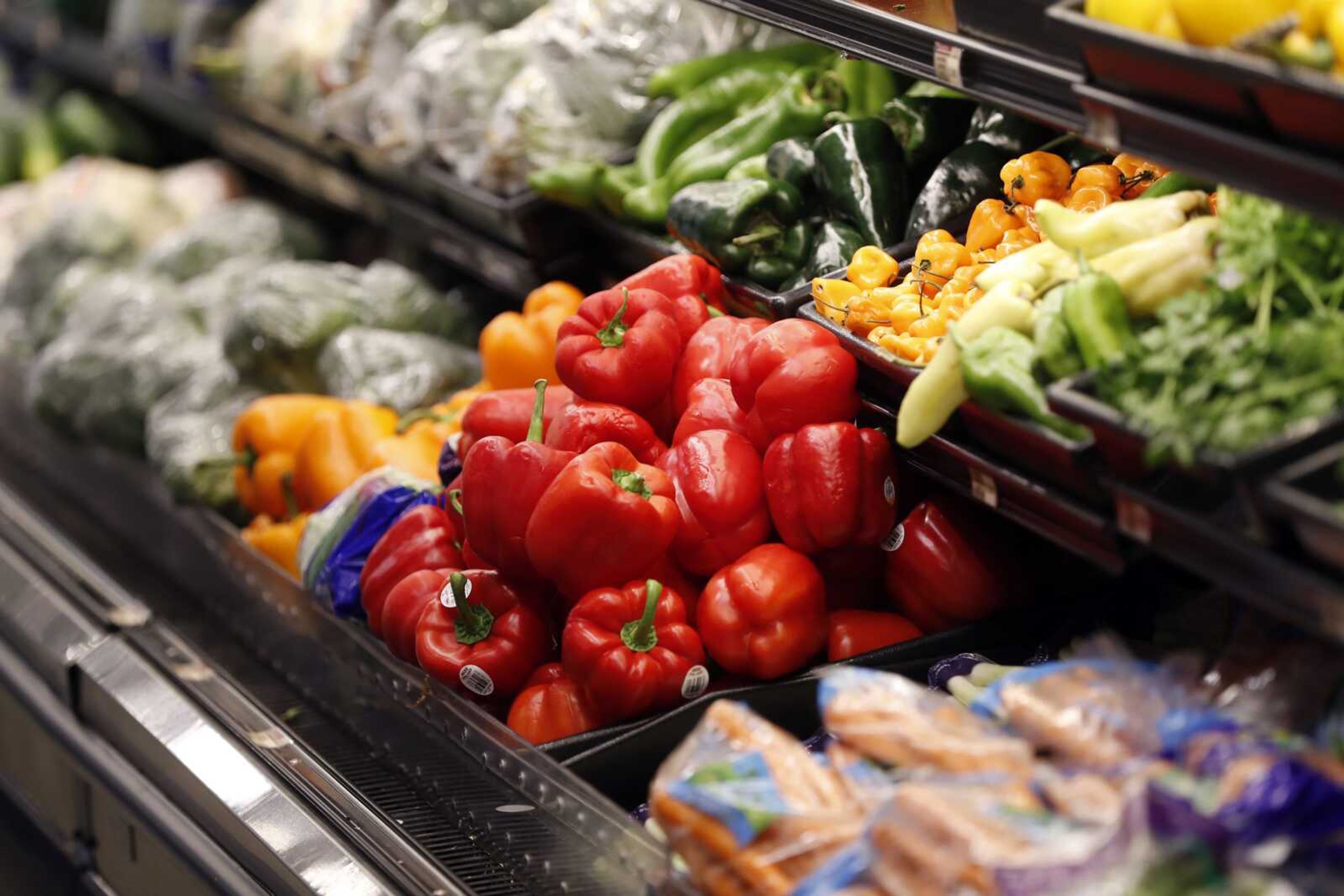 Vegetables are displayed for sale at a grocery store July 11, 2018, in River Ridge, Louisiana. On Thursday, Nov. 17, U.S. agriculture officials proposed changes to the federal program that helps pay the grocery bills for pregnant women, babies and young children that includes keeping a bump in payments for fresh fruits and vegetables allowed during the COVID-19 pandemic.