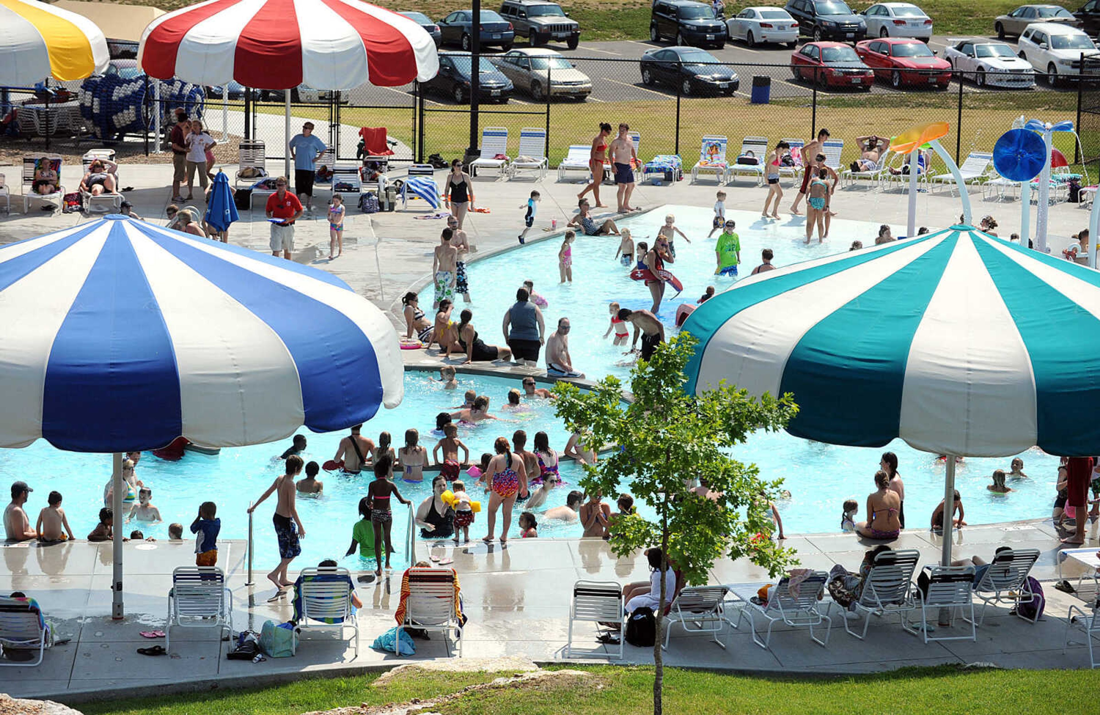 LAURA SIMON ~ lsimon@semissourian.com
People cool off in the pools and play area Sunday, May 27, 2012 at Cape Splash in Cape Girardeau. Sunday set a record high of 95 degrees. The water park's attendance Sunday was 1,120.