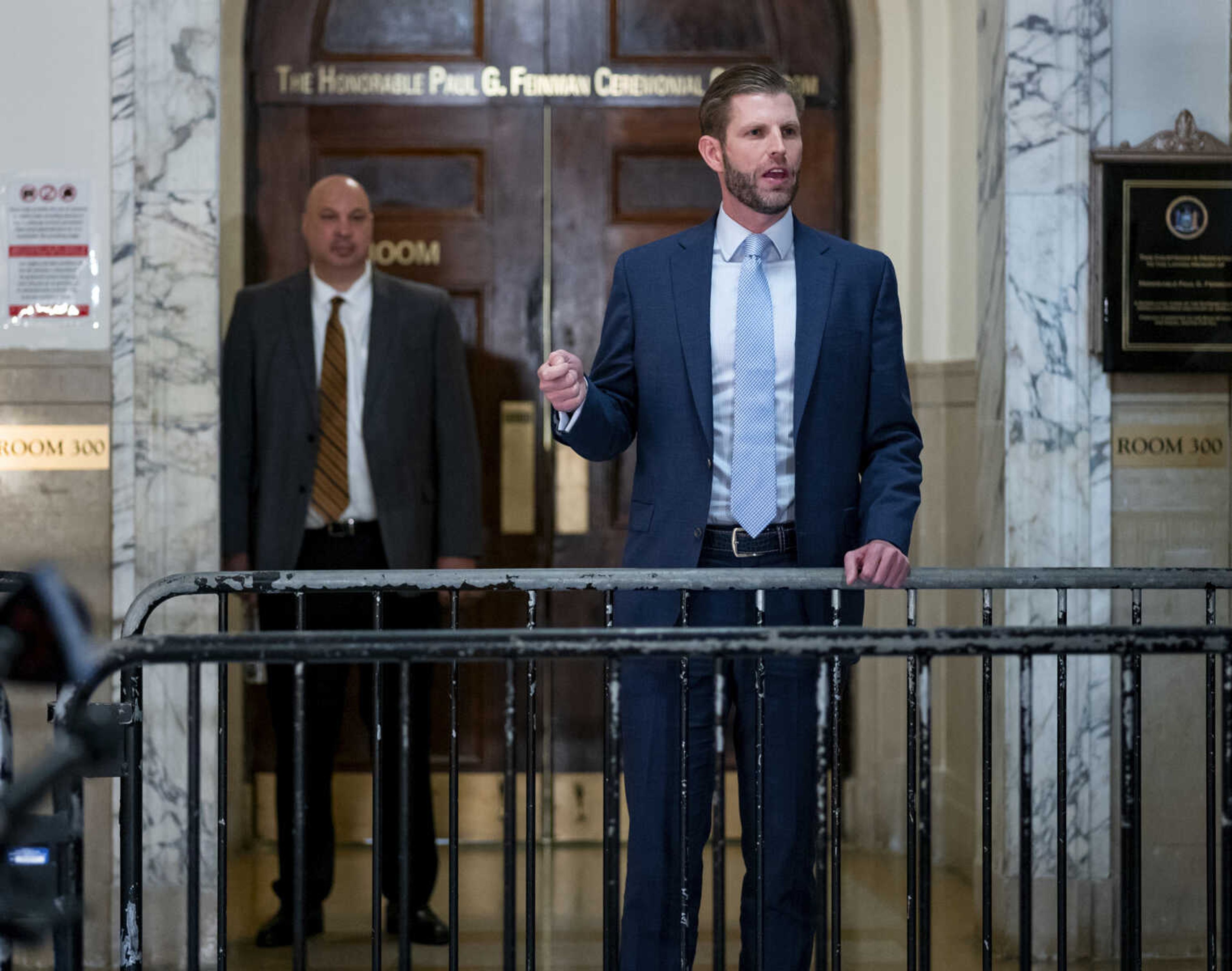 Eric Trump addresses journalists after walking from the courtroom during a civil fraud trial against former President Donald Trump at New York Supreme Court, Friday, Nov. 3, 2023, in New York. (AP Photo/Craig Ruttle)