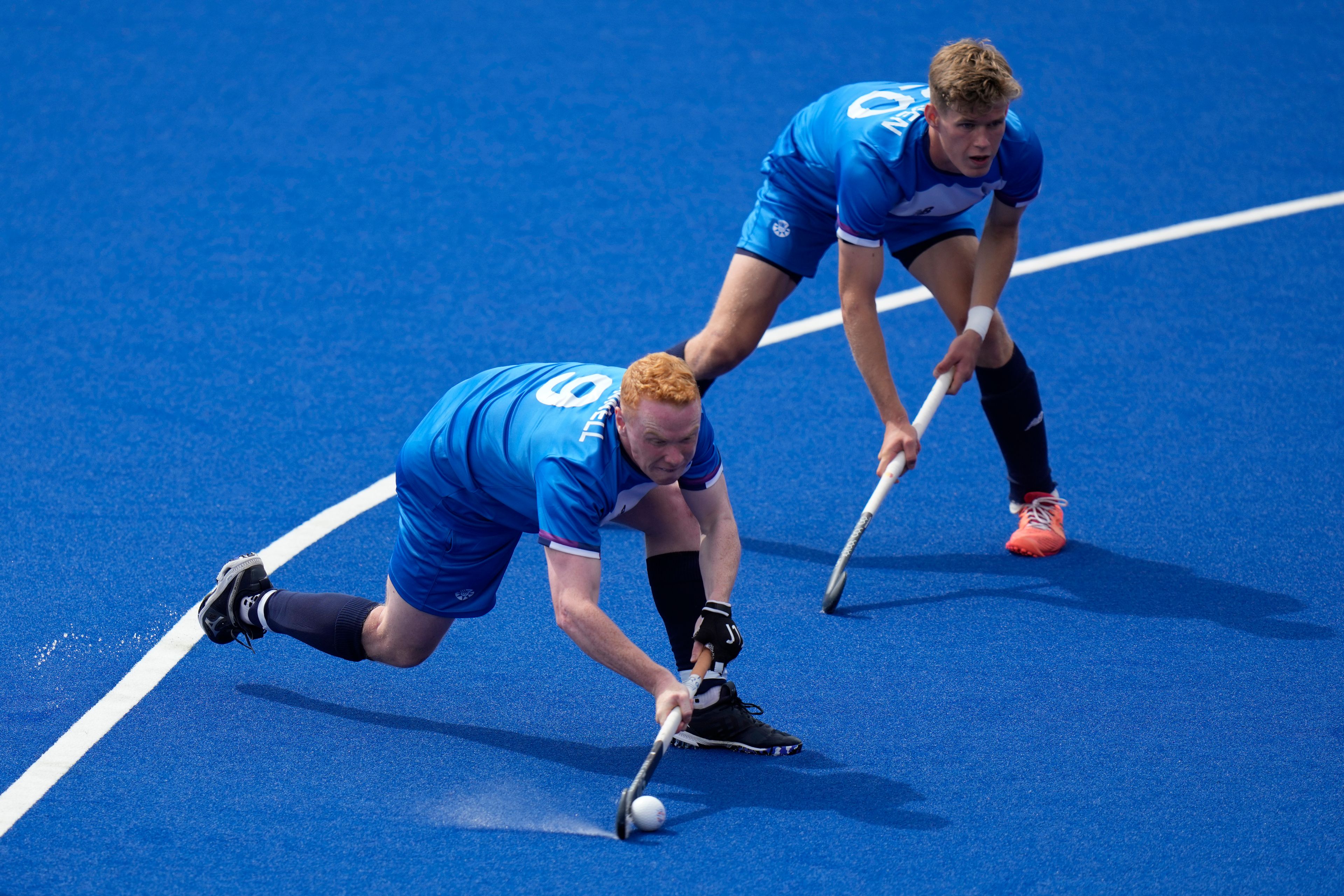 FILE - Scotland's Andrew McConnell shoots and scores goal against South Africa during their men's pool A hockey match at the Commonwealth Games in Birmingham, England, July 31, 2022. A scaled-back 2026 Commonwealth Games hosted by Glasgow will not feature rugby sevens, which was conceived in Scotland in the 1880s. Other sports that have also been dropped include field hockey, triathlon, badminton, Twenty20 cricket, squash, and diving. (AP Photo/Alastair Grant, File)