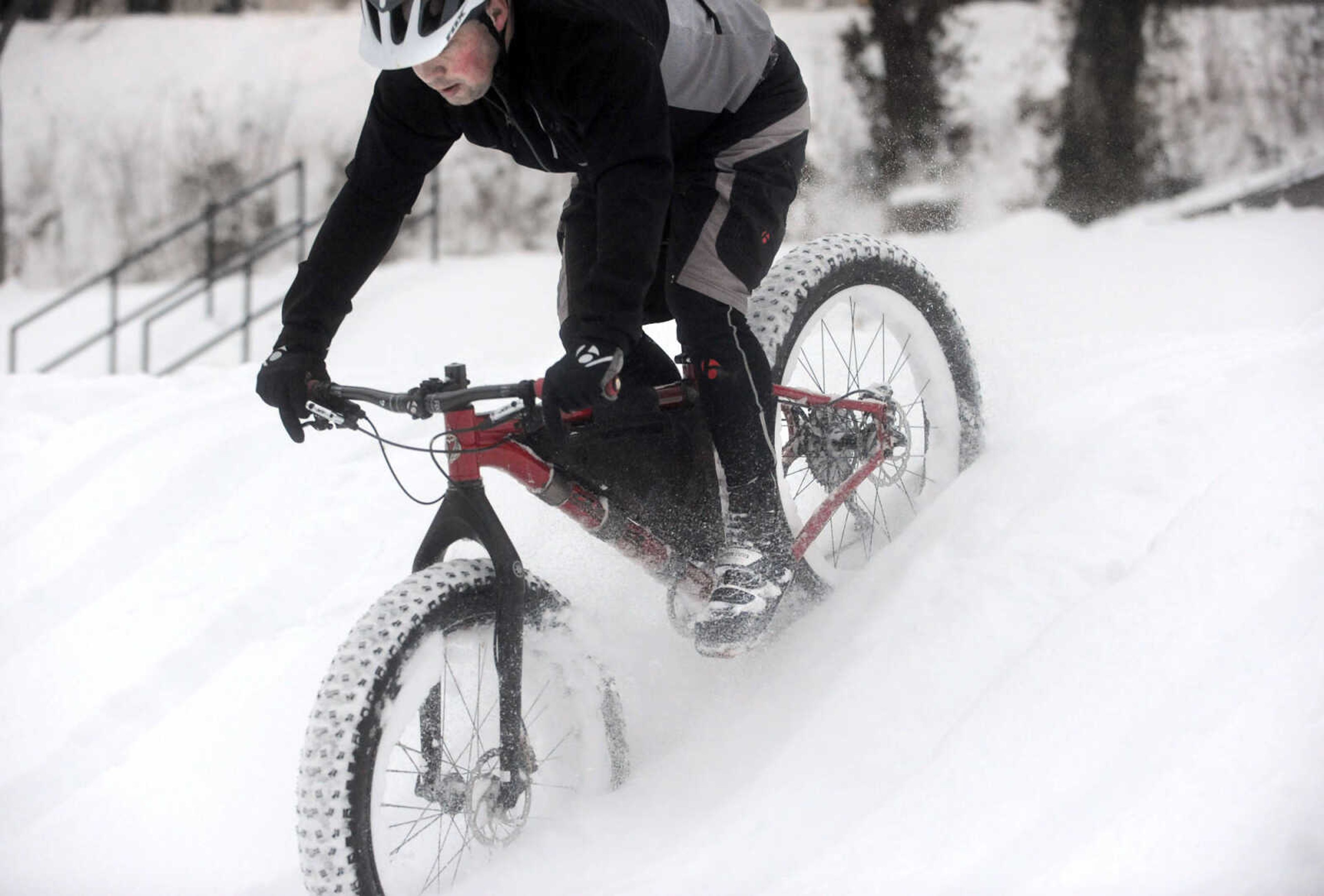 LAURA SIMON ~ lsimon@semissourian.com

Bob Berck rides his fat bike through the snow on the terraces outside Academic Hall Tuesday evening, Feb. 17, 2015.