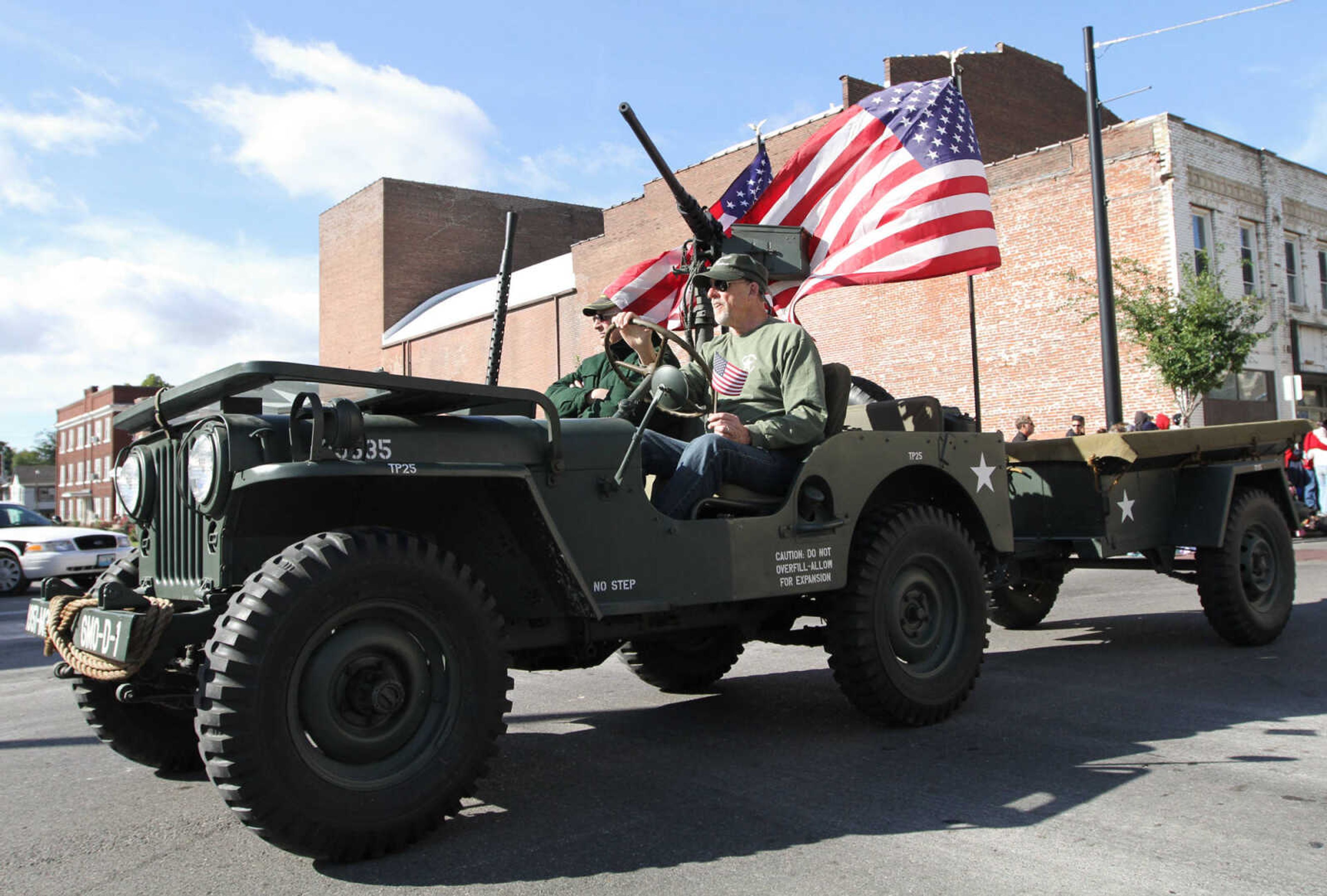 GLENN LANDBERG ~ glandberg@semissourian.com

The Southeast Missouri State University homecoming parade moves down Broadway St. in Cape Girardeau Saturday Morning, Oct. 4, 2014.