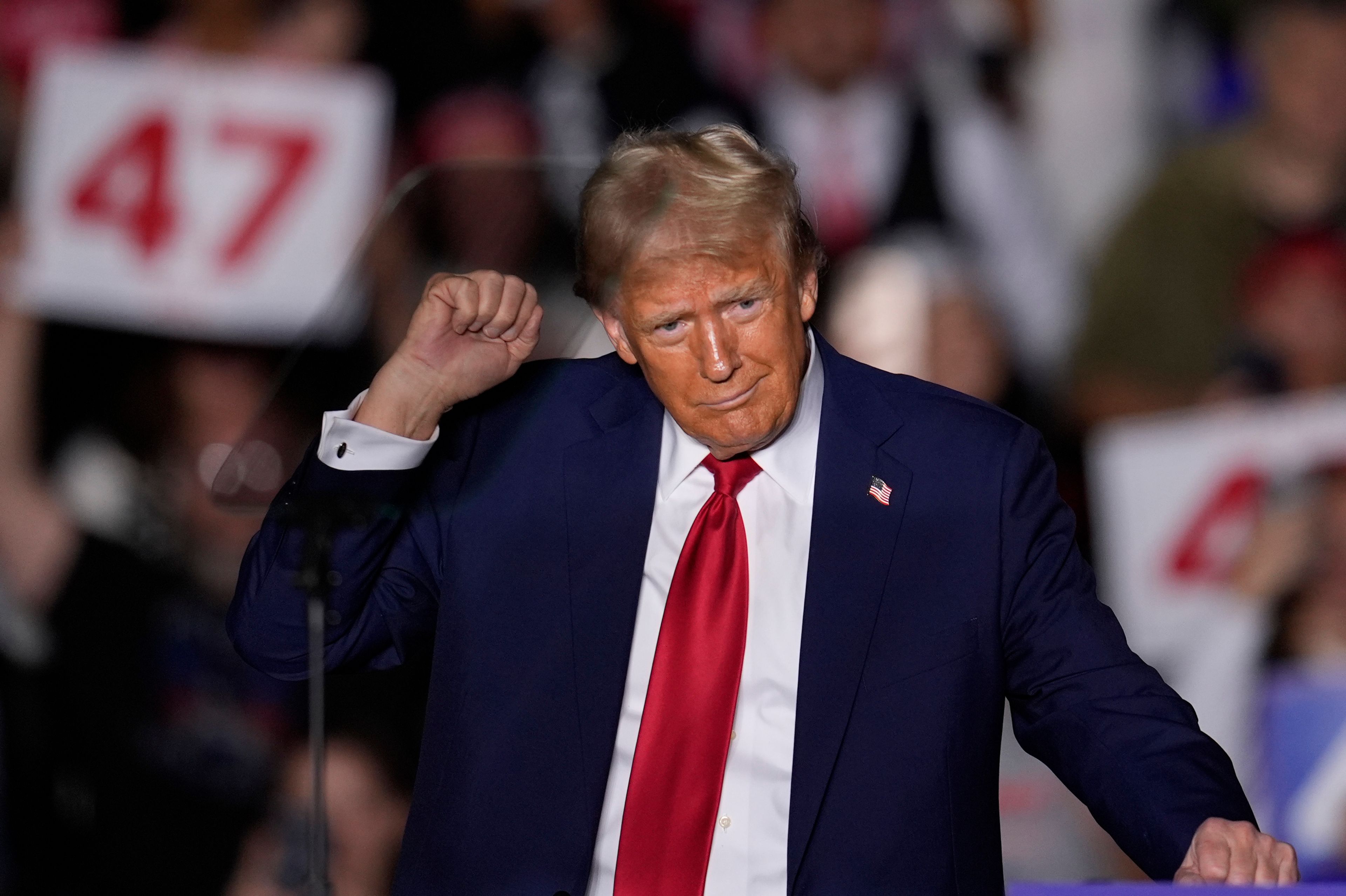 Republican presidential nominee former President Donald Trump dances at a campaign rally at McCamish Pavilion Monday, Oct. 28, 2024, in Atlanta. (AP Photo/Mike Stewart)