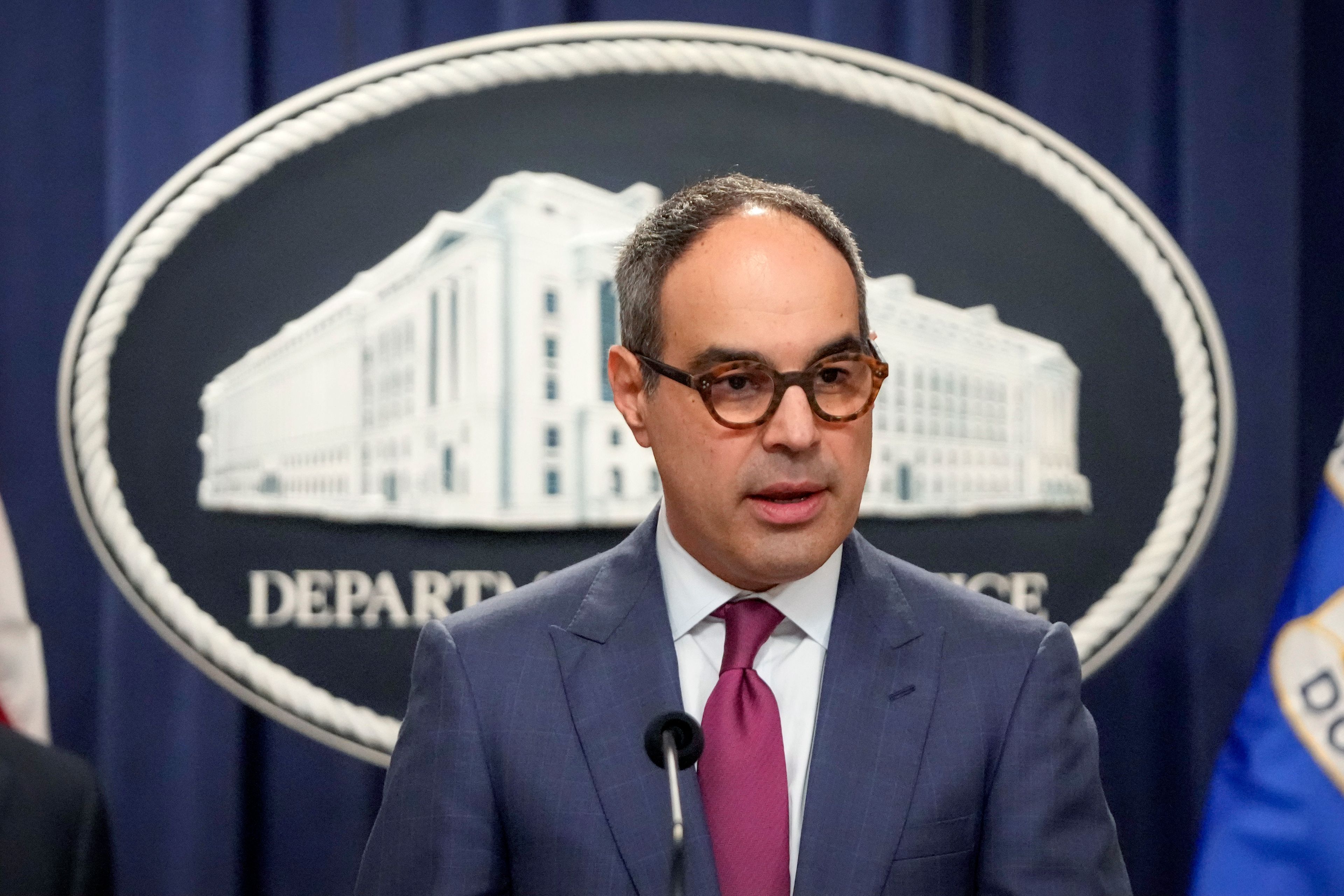 FILE - Assistant Attorney General Jonathan Kanter of the Justice Department's Antitrust Division speaks with reporters during a news conference at the Department of Justice, Aug. 23, 2024, in Washington. (AP Photo/Mark Schiefelbein, File)