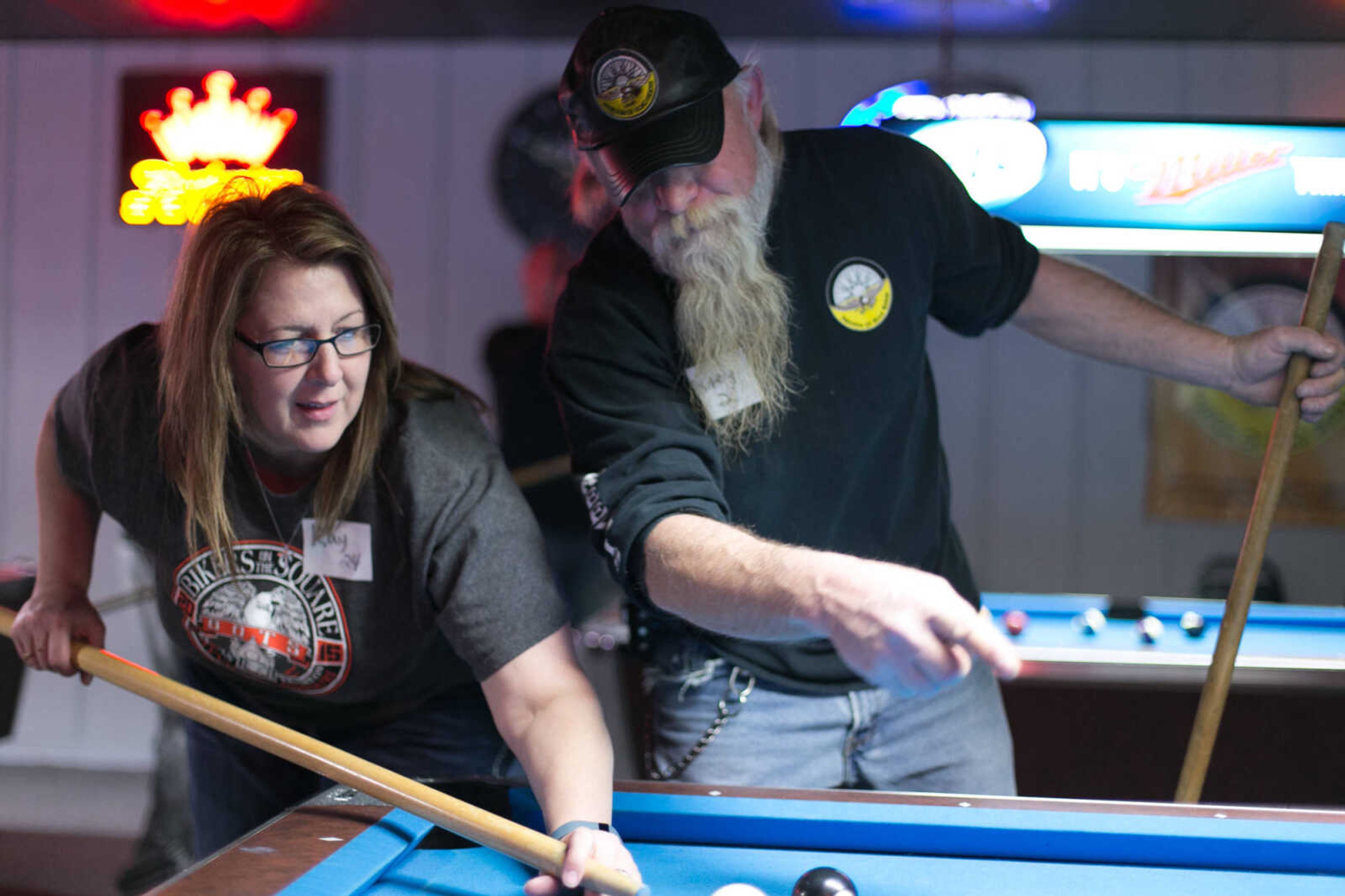 GLENN LANDBERG ~ glandberg@semissourian.com

Whitey Pohlman shares a few pointers with Kay Thompson as she lines up a shot during the annual broomstick pool tournament Saturday, Feb. 27, 2016 at JR's Bar & Billiards in Cape Girardeau. The tournament was sponsored by Local 16 SEMO, Freedom of Road Riders Inc.