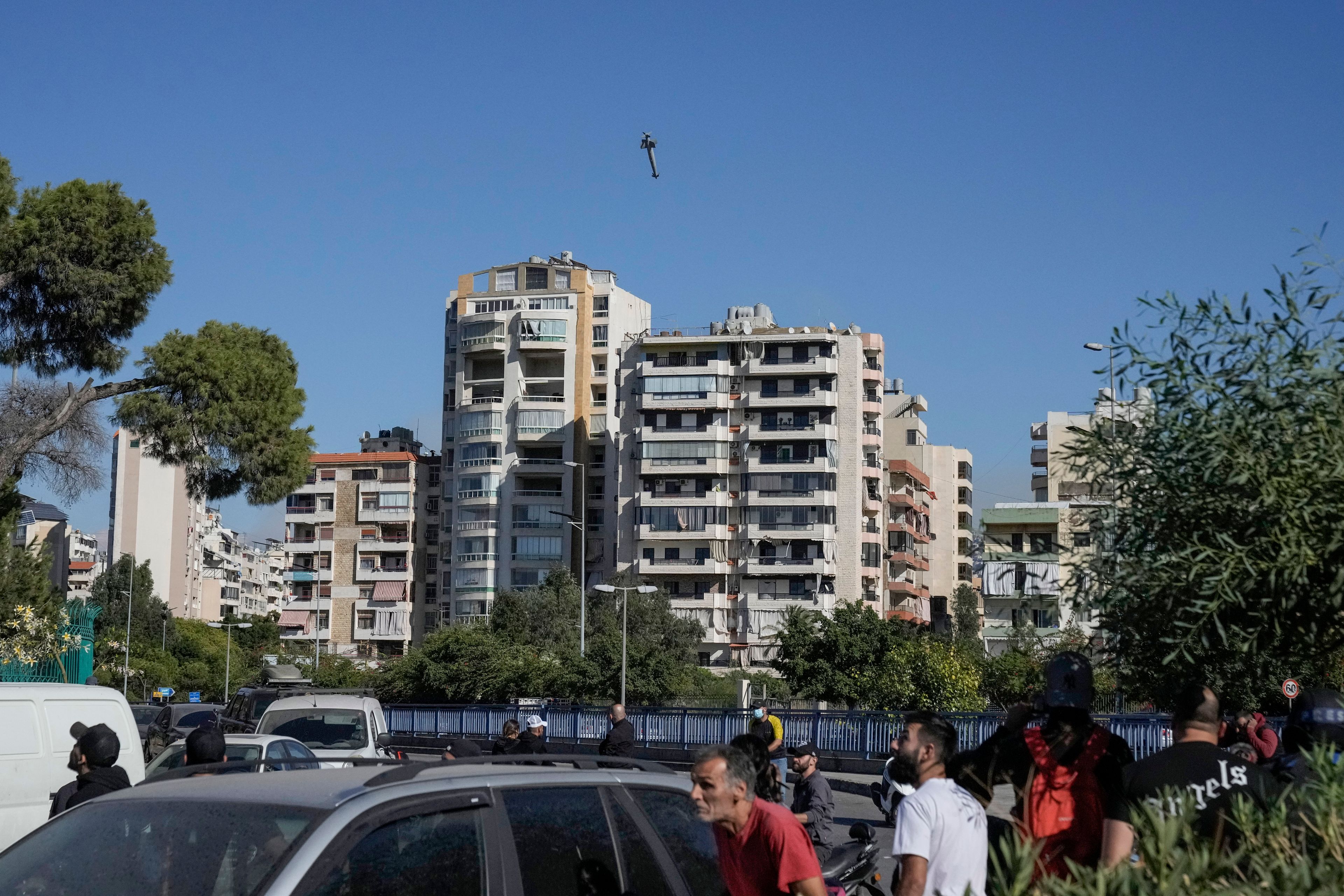 CAPTION CORRECTS TYPE OF MUNITION A bomb dropped from an Israeli jet hits a building in Ghobeiri, Beirut, Lebanon, Tuesday, Oct. 22, 2024. (AP Photo/Bilal Hussein)