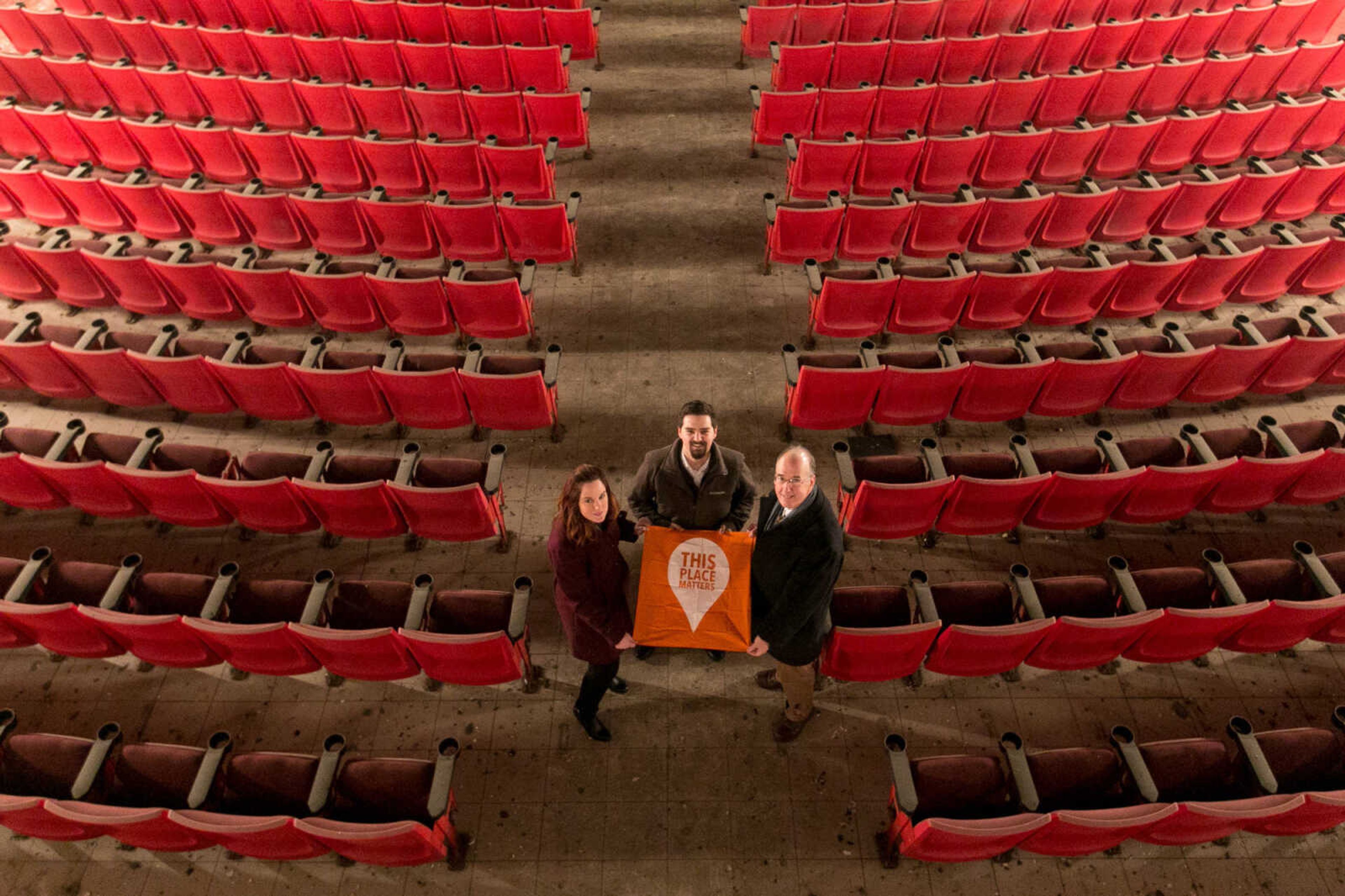 GLENN LANDBERG ~ glandberg@semissourian.com


Alyssa Phares, Chairman of Cape Girardeau Historic Preservation Commission, Kevin Taylor, Old Town Cape Development Director and Dr. Steven Hoffman, Southeast Missouri State University Historic Preservation Coordinator pose for a photo with a flag for the This Place Matters campaign put out by the National Trust for Historic Preservation at the Broadway Theater Wednesday, Feb. 10, 2016 in downtown Cape Girardeau.