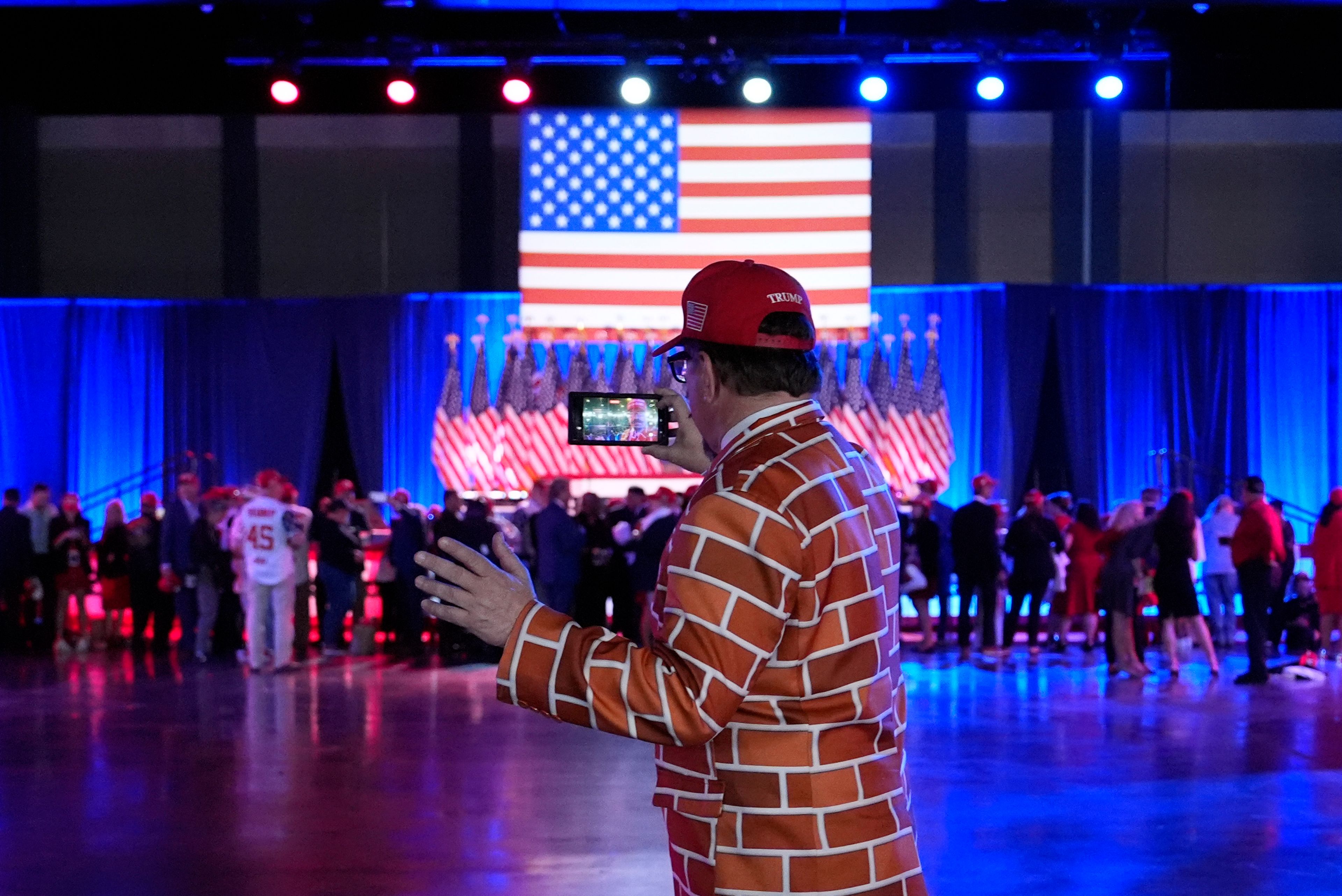 A supporter arrives at an election night watch party for Republican presidential nominee former President Donald Trump Tuesday, Nov. 5, 2024, in West Palm Beach, Fla. (AP Photo/Julia Demaree Nikhinson)