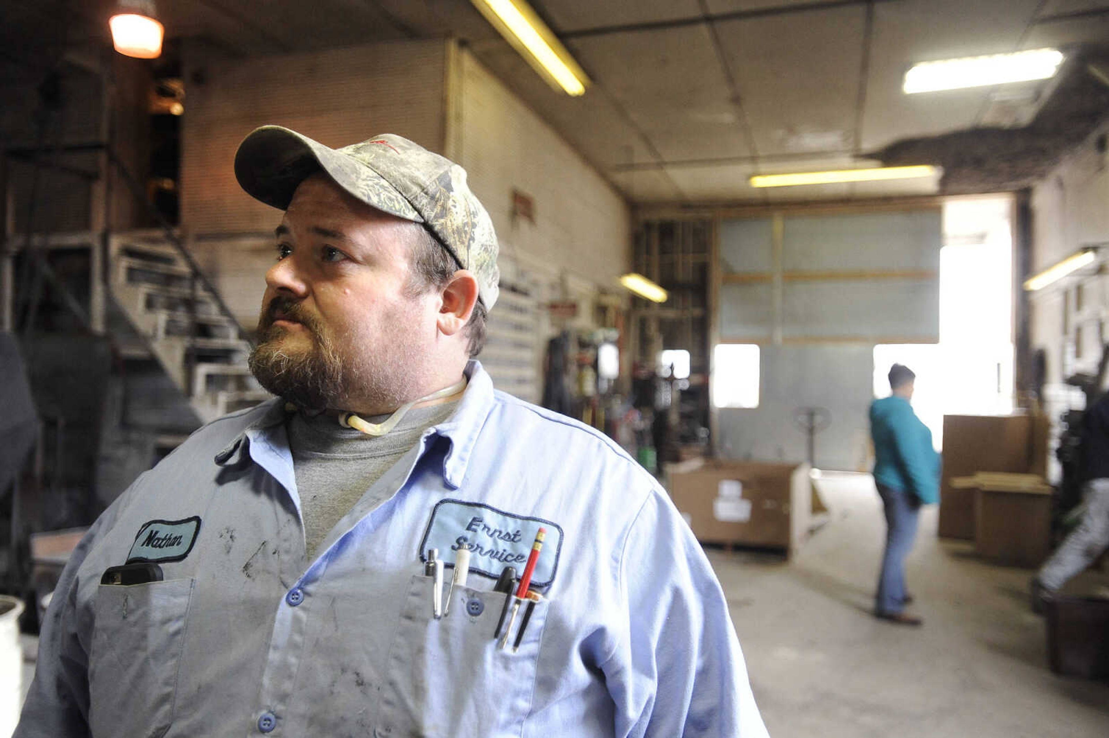 LAURA SIMON ~ lsimon@semissourian.com

Nathan Ernst stands inside the garage of Ernst Service Station & Machine Shop, Tuesday, Dec. 29, 2015, in McBride, Missouri. Ernst, his friends family's and co-workers were removing equipment from the shop to take to a higher location in case the Mississippi River tops the levee near Chester, Illinois. The machine shop had around 14 feet of water inside during the 1993 flood.