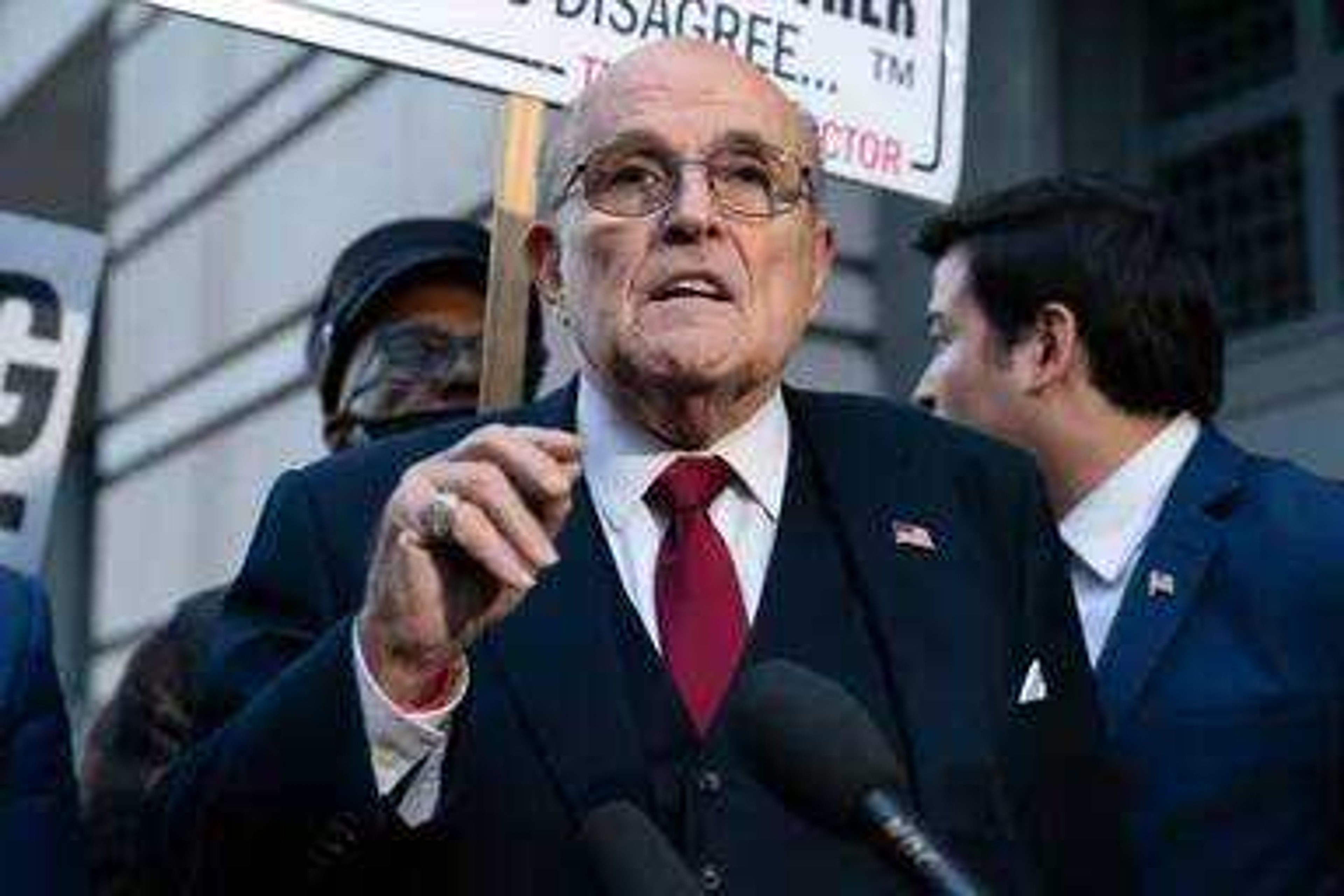 Former Mayor of New York Rudy Giuliani speaks during a news conference outside the federal courthouse in Washington, Dec. 15, 2023. Giuliani, also a former Donald Trump attorney, was processed Monday, June 10, 2024, in the criminal case over the effort to overturn Trump’s Arizona election loss to Joe Biden, the Maricopa County Sheriff's Office said. 