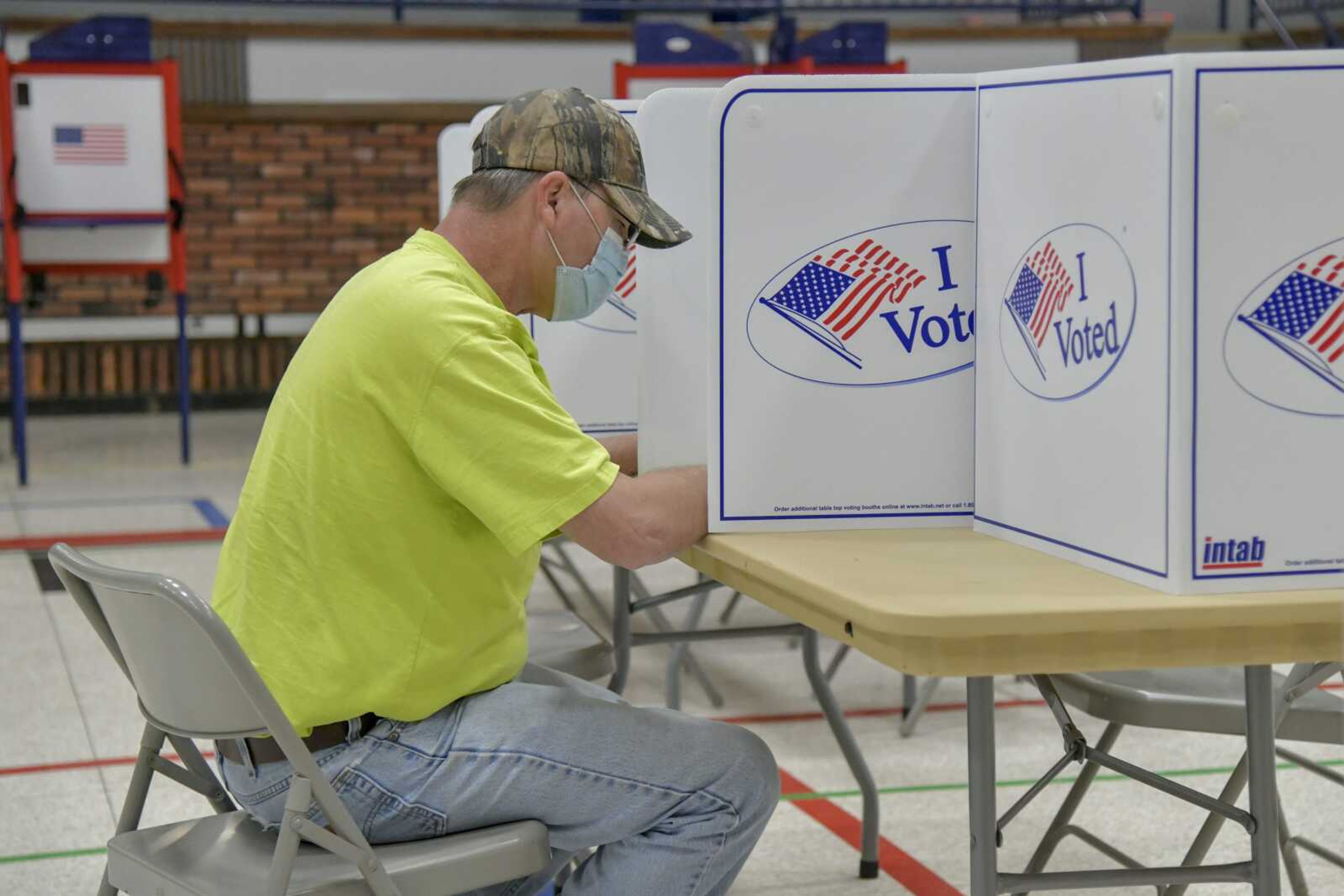 Avra Cox marks his ballot at the Arena Building in Cape Girardeau on Tuesday, April 6, 2021.