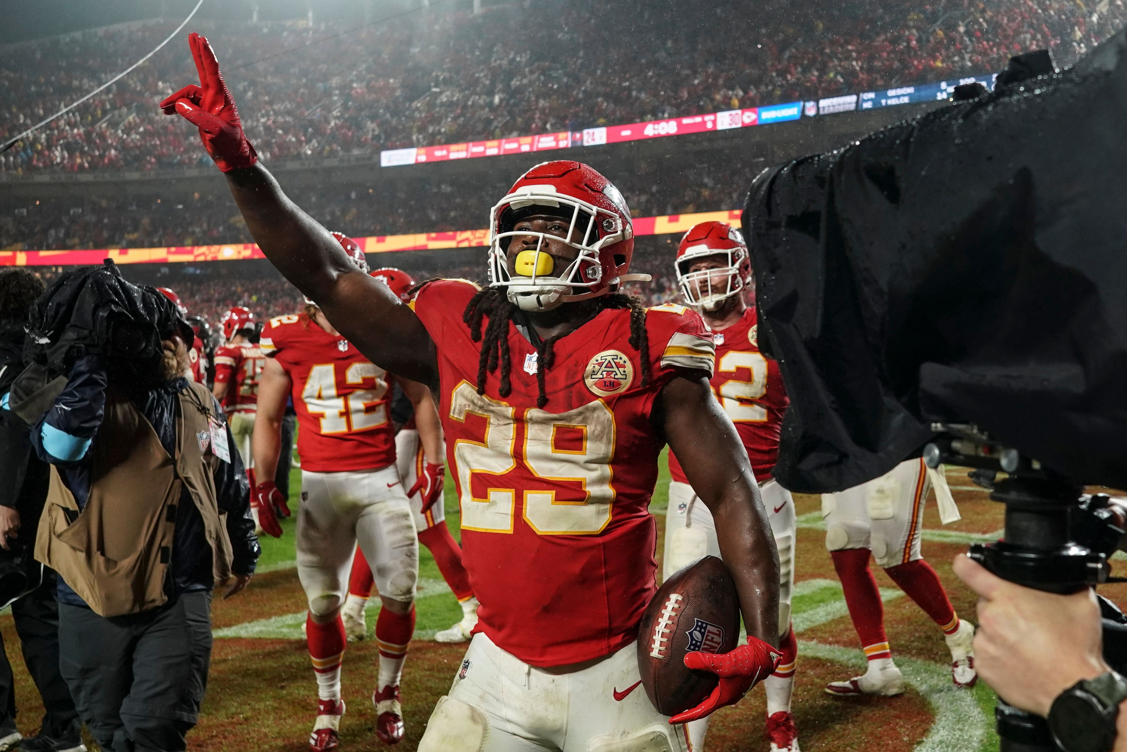 Kansas City Chiefs running back Kareem Hunt (29) celebrates a win over the Tampa Bay Buccaneers in overtime of an NFL football game, Monday, Nov. 4, 2024, in Kansas City, Mo. (AP Photo/Ed Zurga)