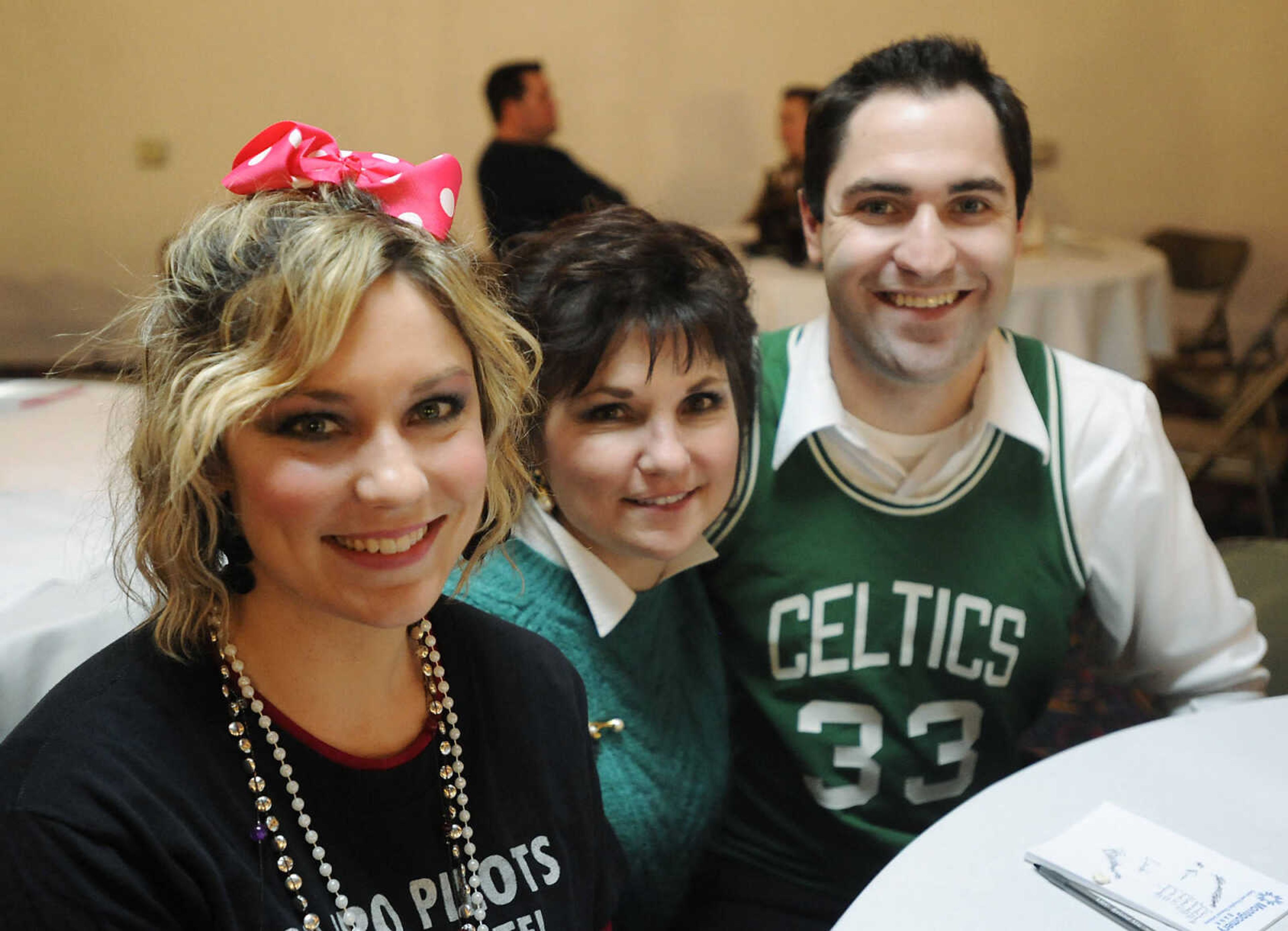 Natalie Jones, left, Debbie Profilet and Tyler Profilet at Discovery Playhouse's '70s, '80s and '90s Trivia Night Friday, Feb. 22.