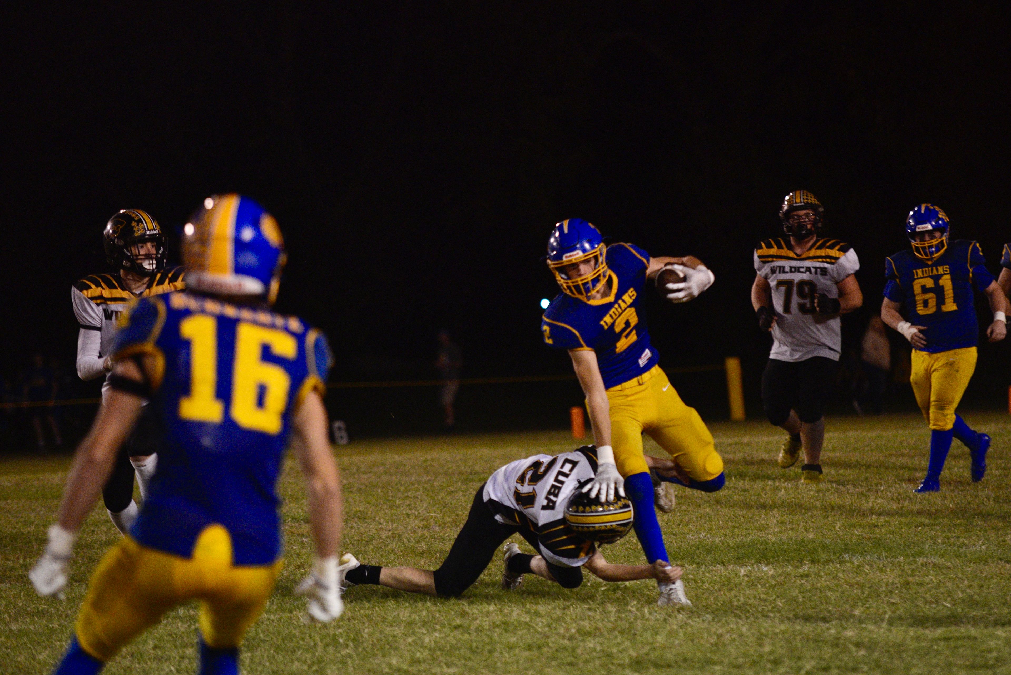 St. Vincent’s Jacob Seabaugh stiff-arms a Cuba defender on Friday, Oct. 11, in Perryville. 