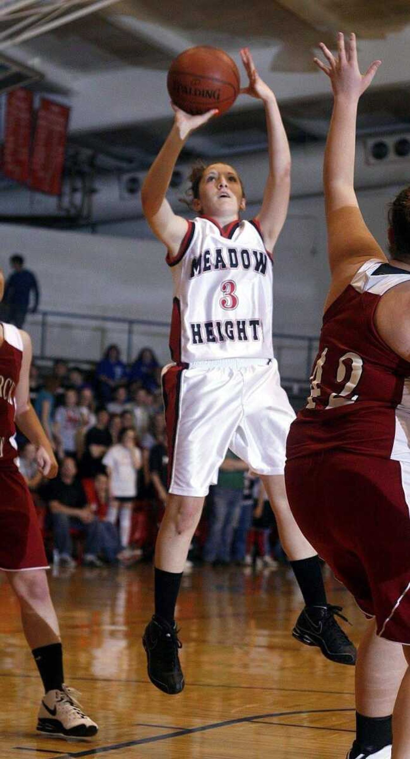 Meadow Heights' Hattie Cook scores during the first half.